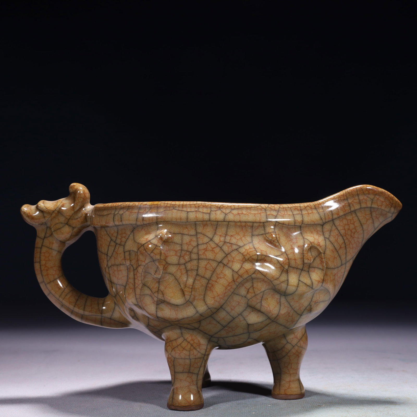 An Exquisite Ge yao Tripod Dragon-Ears Cup: An Exquisite Ge yao Tripod Dragon-Ears Cup,Song Dynasty,China,Size:8.7inx3.5inx4.5in,Weight:650g 哥窑三足龙耳杯子,中国宋代