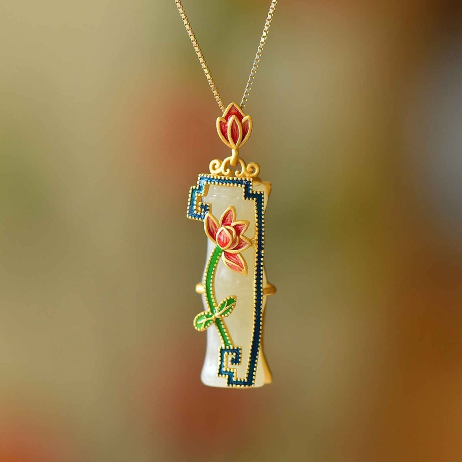An Exquisite Sterling Silver-Gold Plated Inlaid White Jade Enamel Pendant: An Exquisite Sterling Silver-Gold Plated Inlaid White Jade Enamel Pendant 纯银镀金镶白玉珐琅吊坠