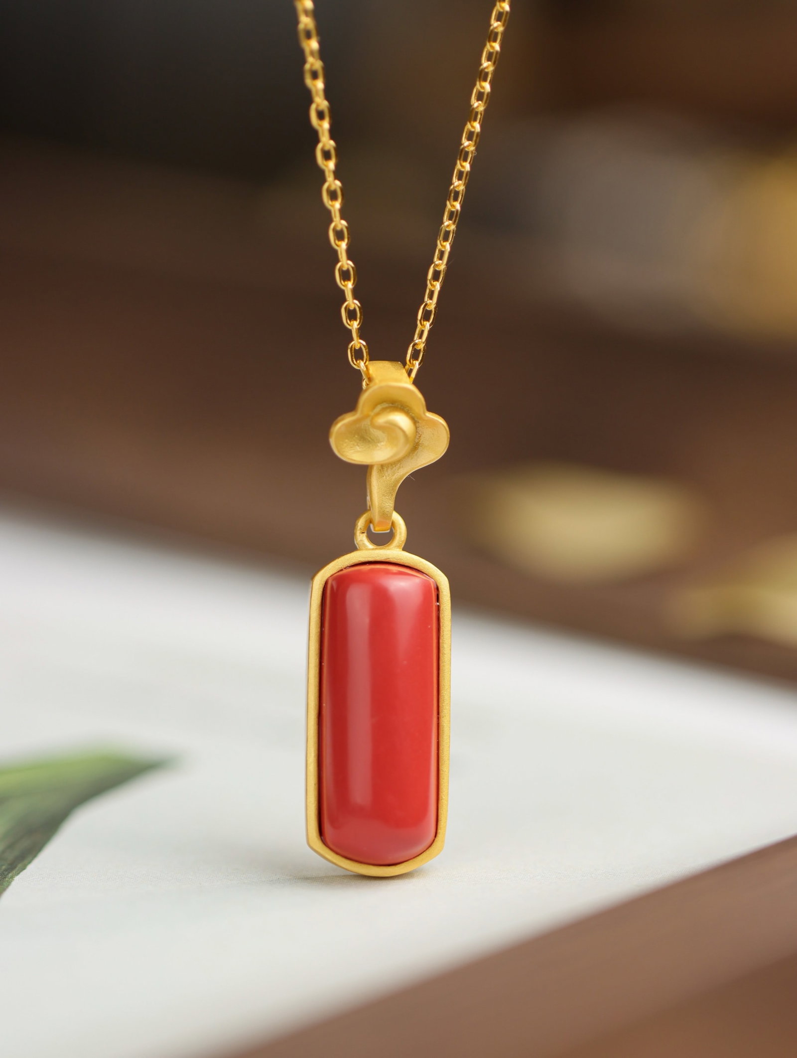 An Exquisite Sterling Silver-Gold Plated Inlaid Cinnabar Pendant: An Exquisite Sterling Silver-Gold Plated Inlaid Cinnabar Pendant 纯银镀金镶朱砂吊坠