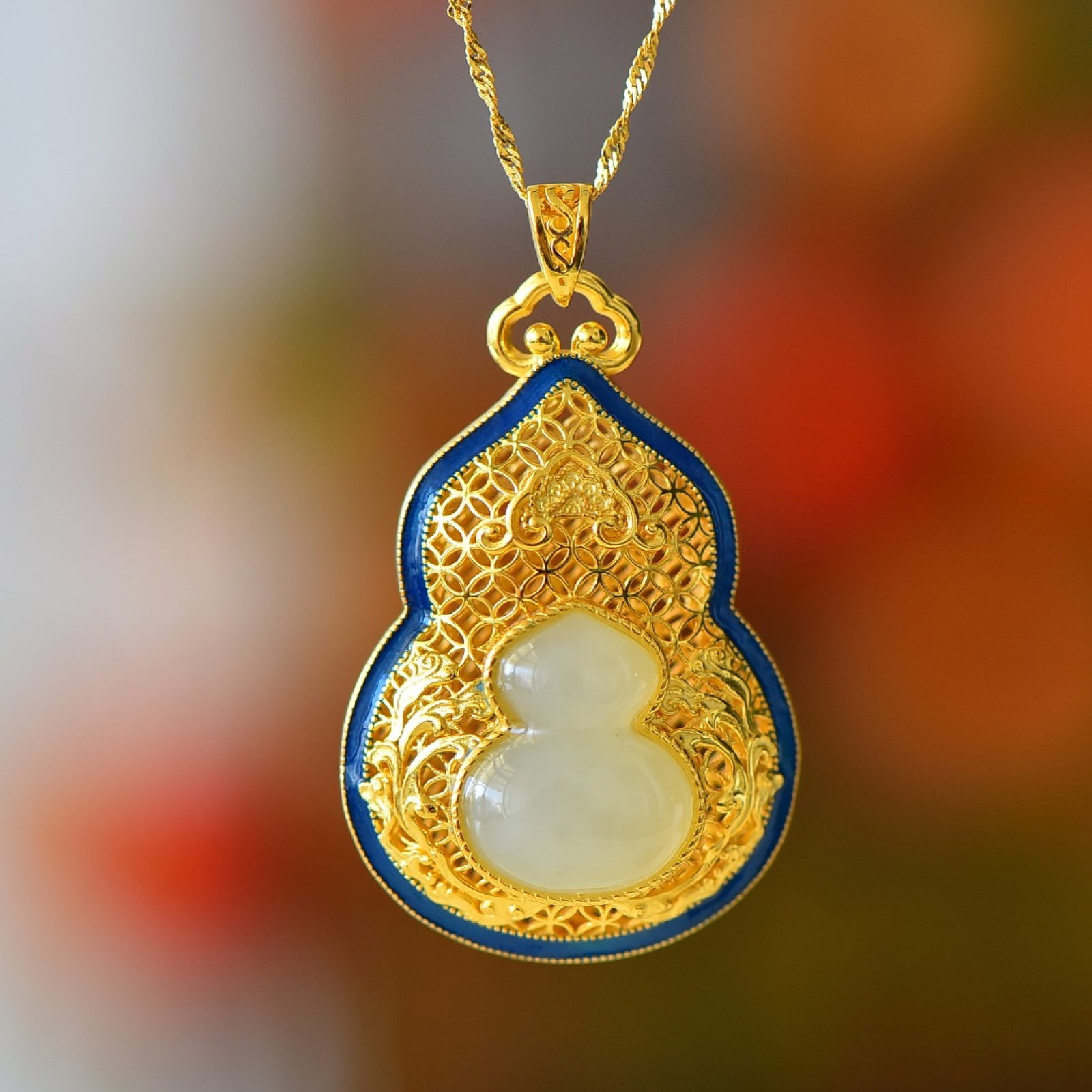 An Exquisite Sterling Silver-Gold Plated Inlaid White Jade Gourd Pendant: An Exquisite Sterling Silver-Gold Plated Inlaid White Jade Gourd Pendant 纯银镀金镶白玉葫芦吊坠