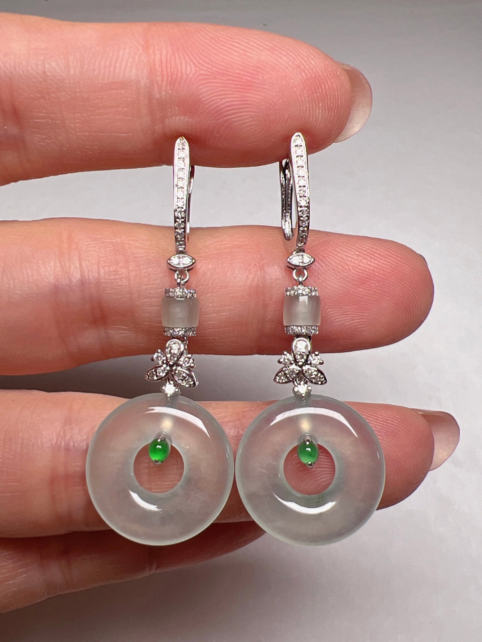 A Pair of Exquisite 18k Gold Diamond Inlaid Jadeite Earrings: A Pair of Exquisite 18k Gold Diamond Inlaid Jadeite Earrings,Size(Loose Stone):0.6inx0.1in 一对18k金钻镶嵌翡翠耳环