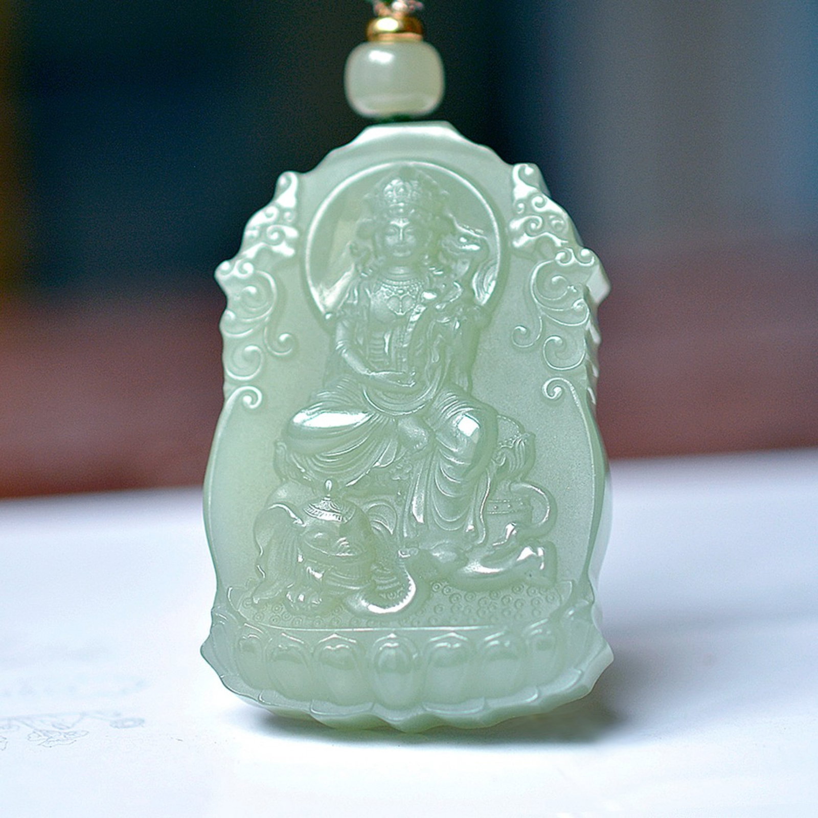 An Exquisite Greenish Jade Statue of Samantabhadra Pendant (1 of 5)