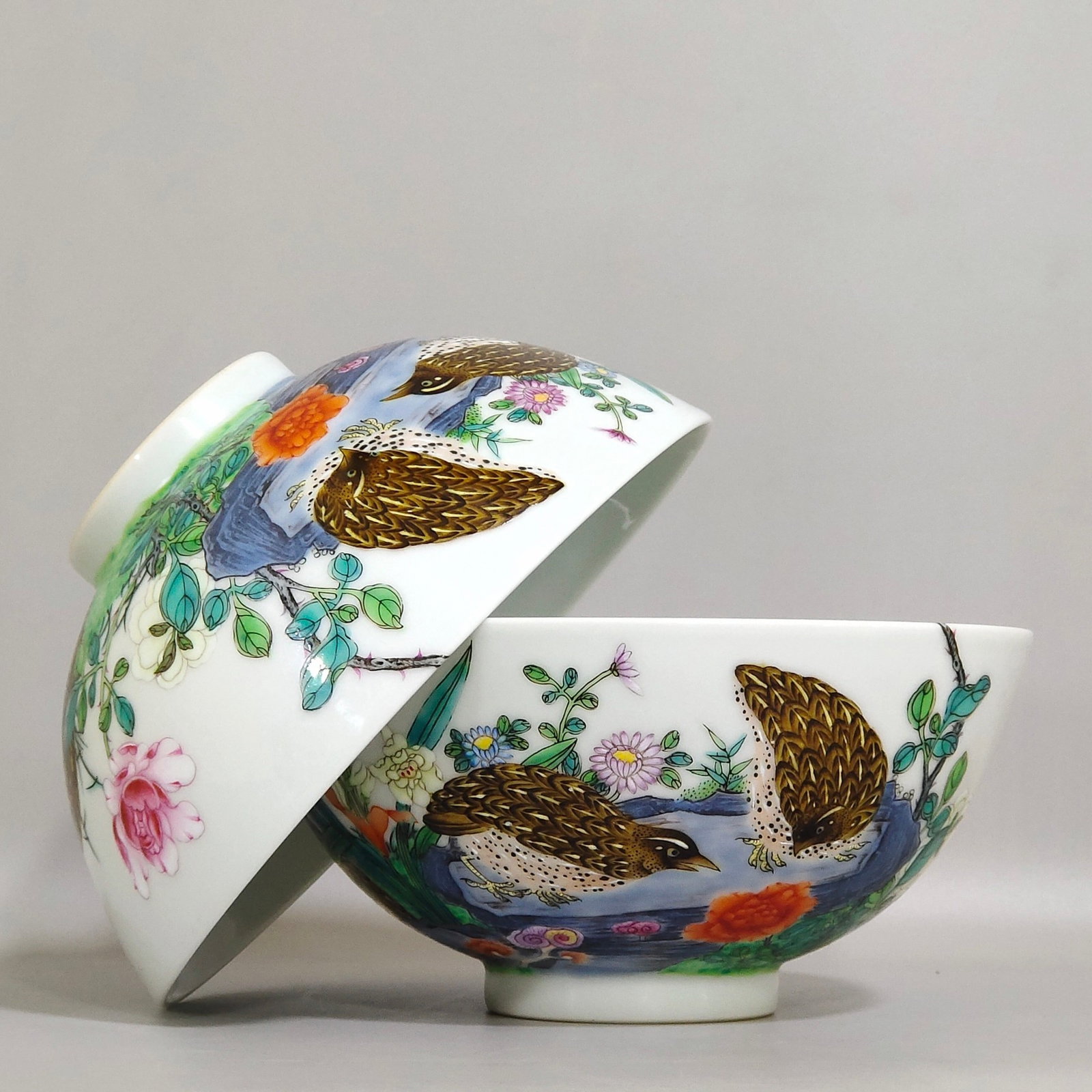 A Pair of Exquisite Famille-Rose Flower and Bird Pattern Bowls: A Pair of Exquisite Famille-Rose Flower and Bird Pattern Bowls,Qing Dynasty,China,Yongzheng Six-character Mark,Size:2.7inx5.6in 一对粉彩花鸟纹碗,中