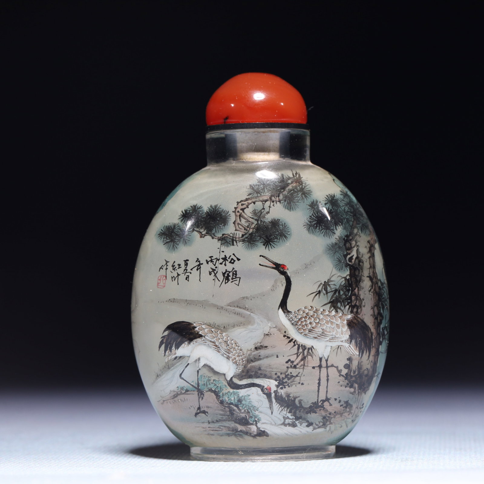 An Exquisite Glass Crane Pattern Snuff Bottle: An Exquisite Glass Crane Pattern Snuff Bottle,Qing Dynasty,China,Size:2.2inx1.2inx3.1in,Weight:68.4g 琉璃鹤纹鼻烟壶,中国清代