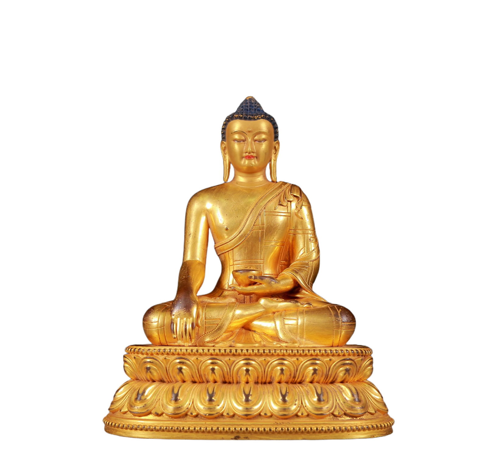 A Solemn Gilt Bronze Statue of Sakyamuni: A Solemn Gilt Bronze Statue of Sakyamuni,Ming Dynasty, China,Size:6.3inx4.3inx8.5in,Weight:1490g 铜鎏金释迦摩尼像，明代