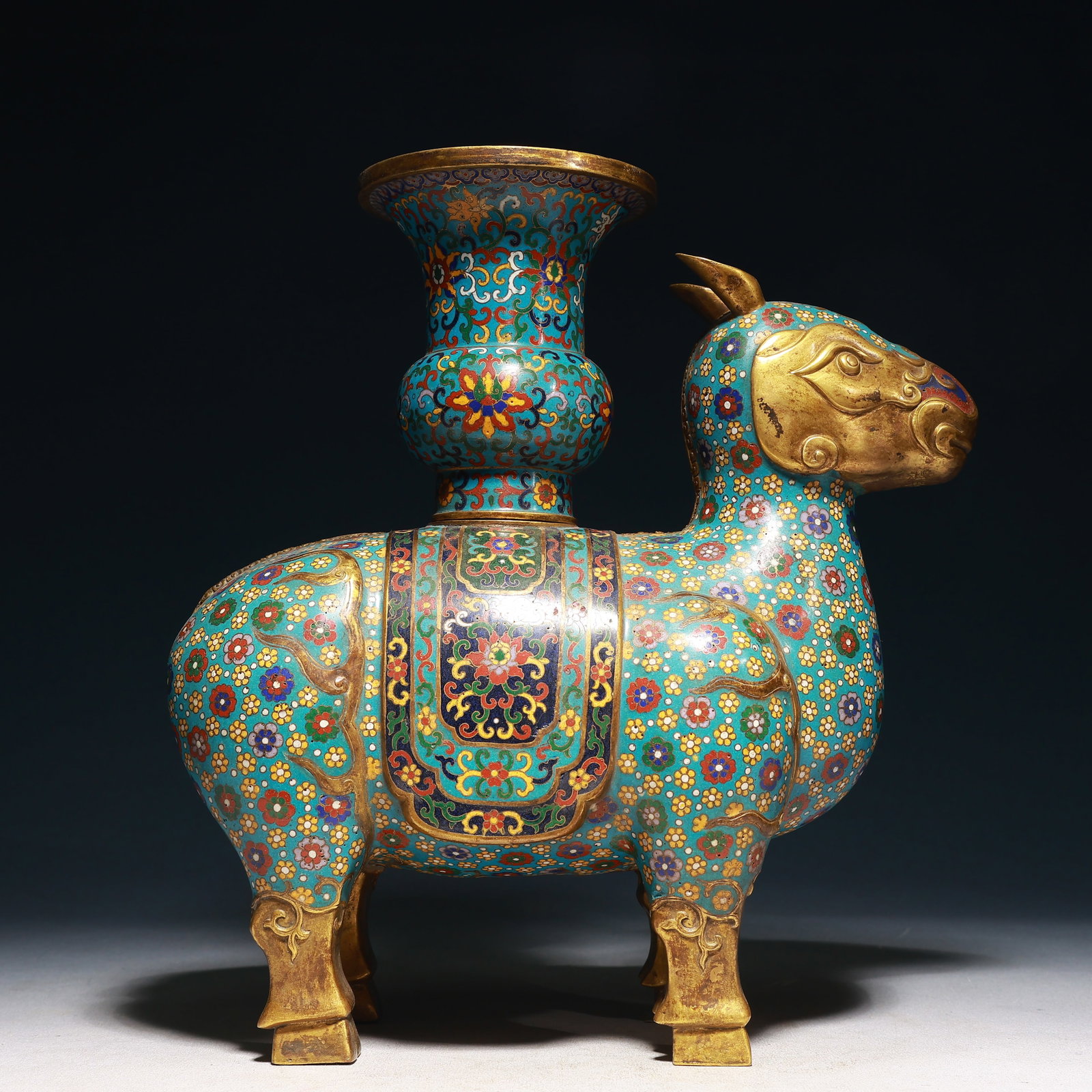A Rare Cloisonne Flower Pattern Auspicious Beast Ornament: A Rare Cloisonne Flower Pattern Auspicious Beast Ornament,Qing Dynasty,China,Size:10.6inx5.1inx12in,Weight:2100g 景泰蓝花卉纹瑞兽摆件,ߑ