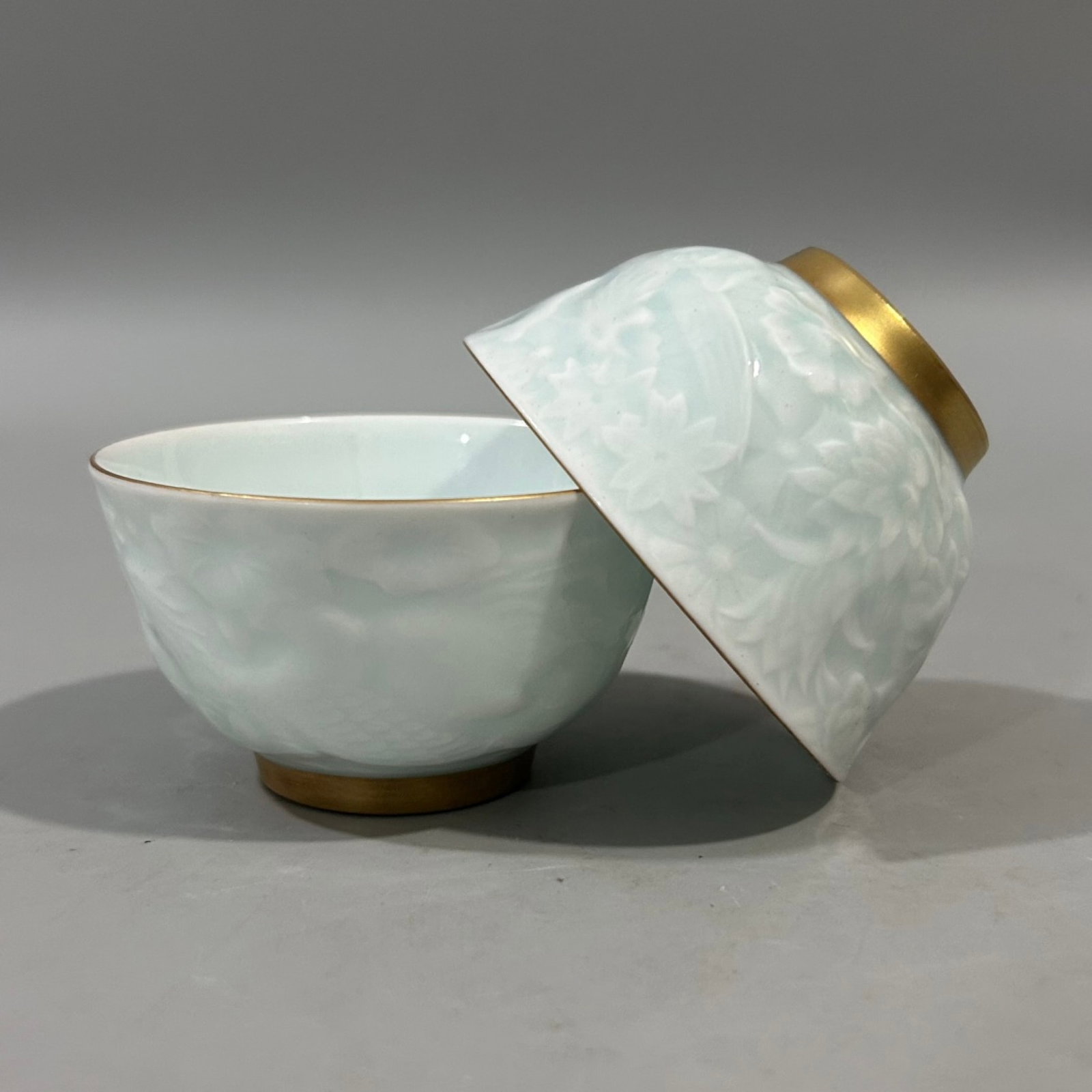A Pair of Exquisite White Glazed Cover with Gold Peony and Phoenix Pattern Cups: A Pair of Exquisite White Glazed Cover with Gold Peony and Phoenix Pattern Cups,Qing Dynasty,China,Qianlong Four-character Mark,Size:2inx3.1in
