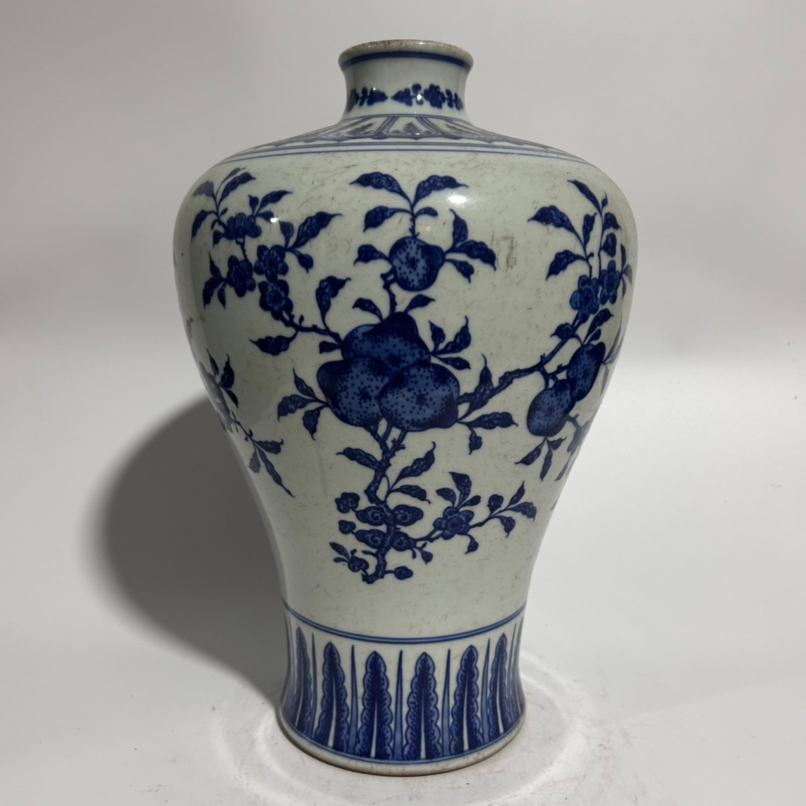 A Rare Blue and White Fruit Pattern Vase: A Rare Blue and White Fruit Pattern Vase,Qing Dynasty,China,Qianlong Six-character Mark,Size:6.5inx13in 青花果纹瓶,中国清代,乾隆ࠤ