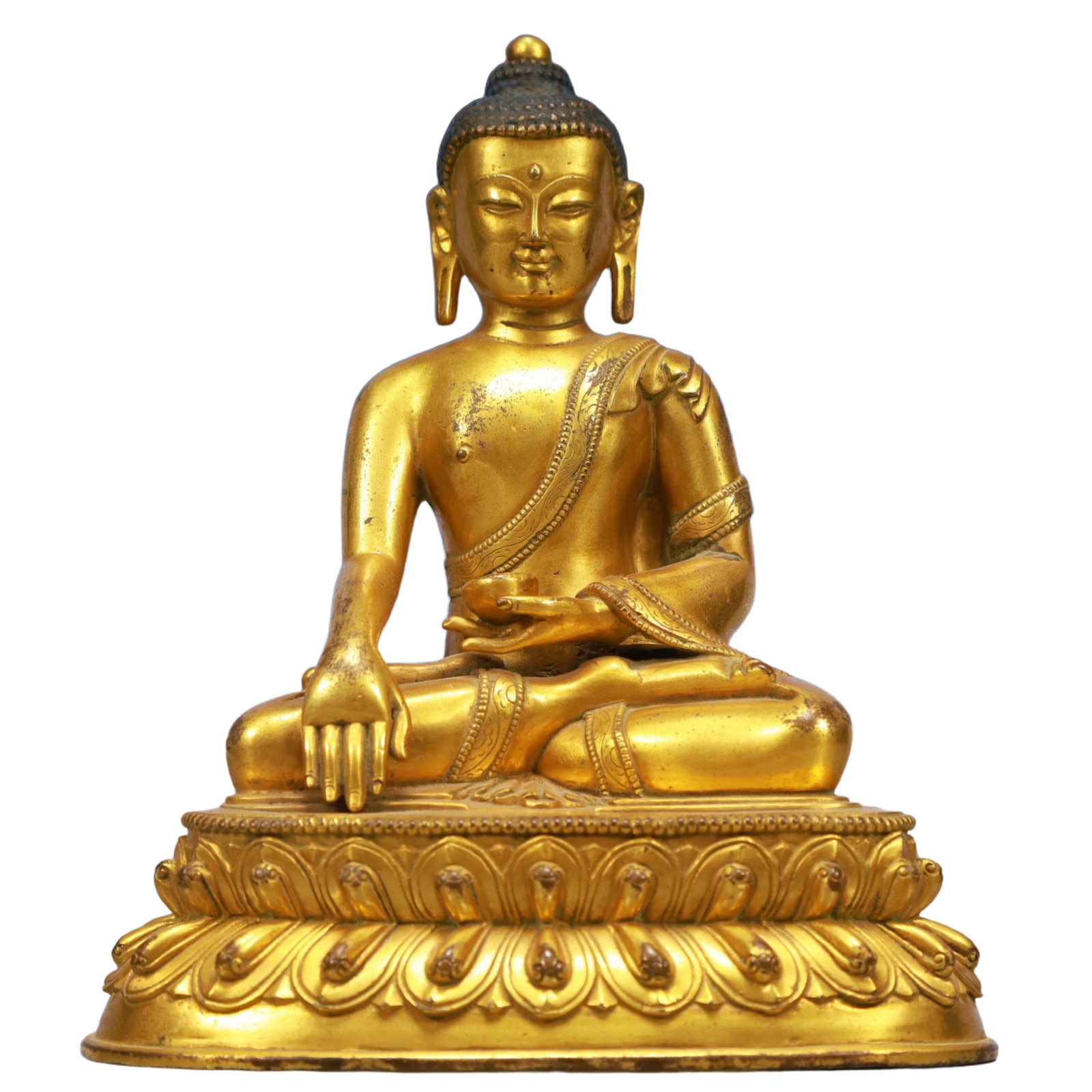 A Solemn Gilt Bronze Statue of Sakyamuni: A Solemn Gilt Bronze Statue of Sakyamuni,Qing Dynasty, China,Size:6.1inx4.1inx7.3in,Weight:1950g 铜鎏金如来像,中国清代