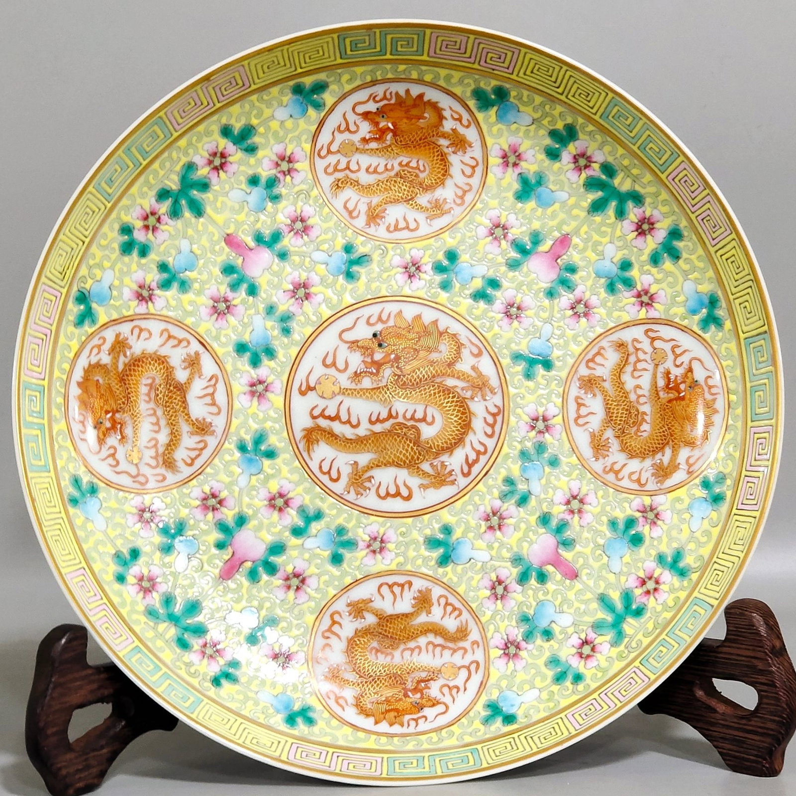 An Exquisite Famille-Rose Yellow Ground Painted Gold Flower and Dragon Pattern Plate: An Exquisite Famille-Rose Yellow Ground Painted Gold Flower and Dragon Pattern Plate,Qing Dynasty,China,Xianfeng Six-character Mark,Size:1.8inx8.1in 粉彩黄地描金