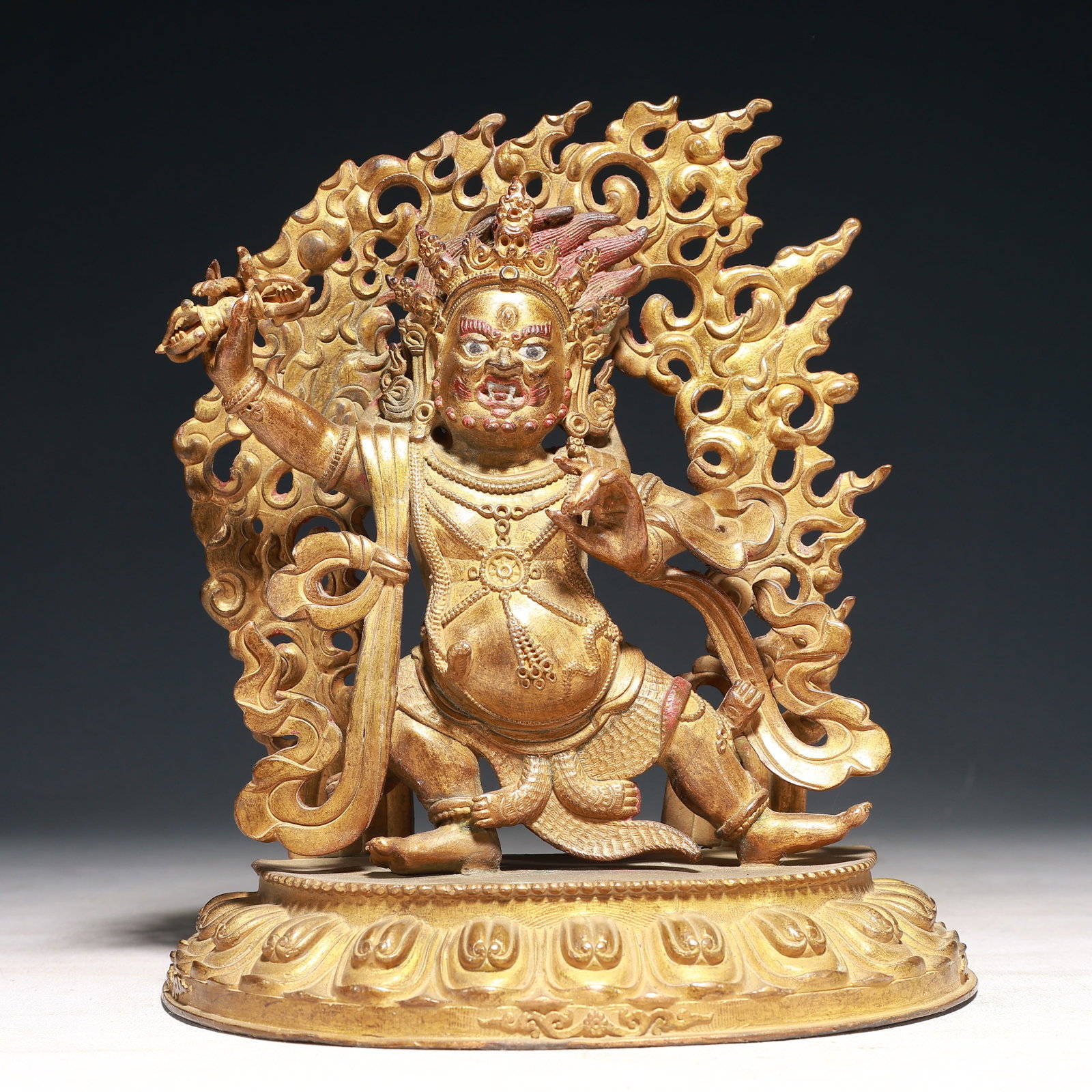 A Solemn Gilt Bronze Statue of Vajra protector,With Inscription: A Solemn Gilt Bronze Statue of Vajra protector,With Inscription,Qing Dynasty,China,Size:7.9inx3.5inx9.1in,Weight:2400g 铜鎏金金刚护法像,带铭
