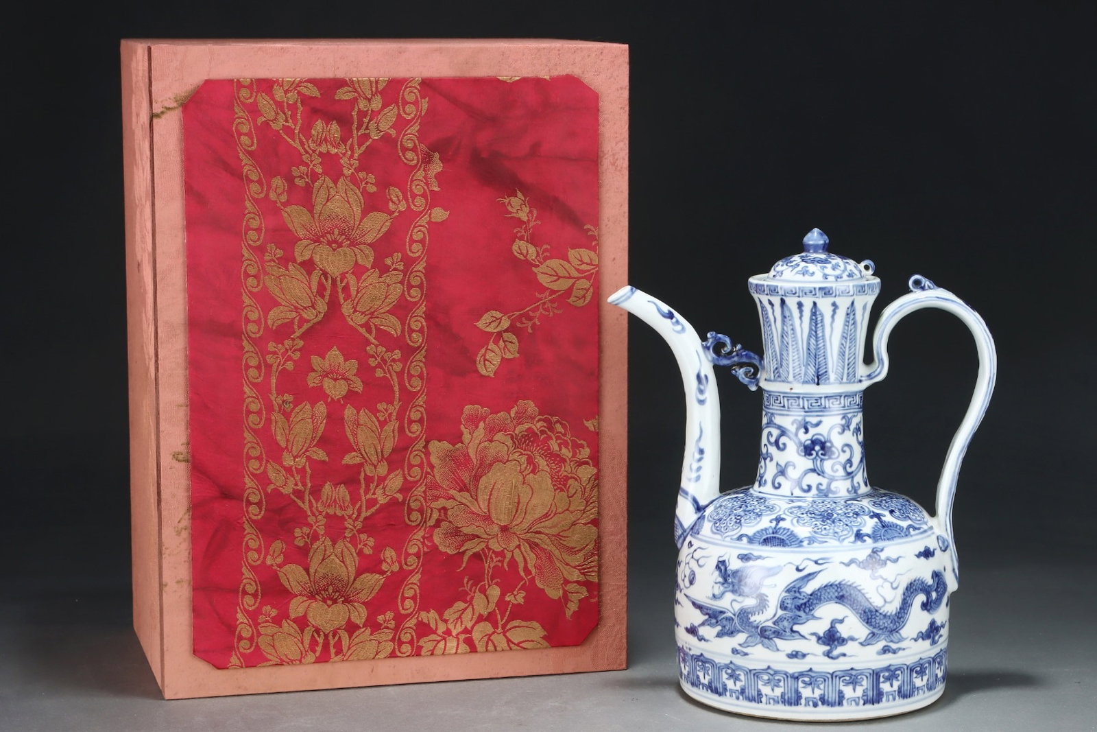 A Rare Blue and White Auspicious Cloud and Dragon Pattern Ewer: A Rare Blue and White Auspicious Cloud and Dragon Pattern Ewer,Ming Dynasty,China,Size:12inx9.8in 青花祥云龙纹执壶,中国明代