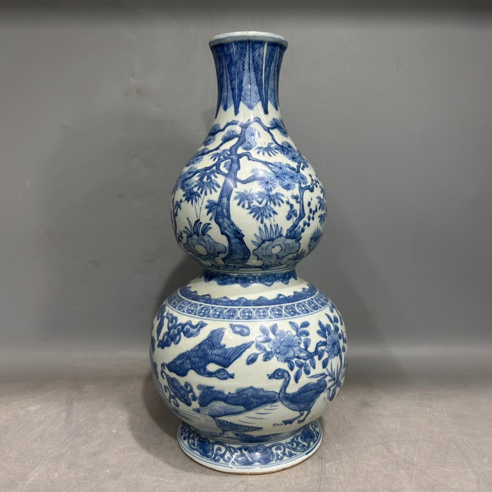 A Rare Blue and White Flower and Bird Pattern Gourd Vase: A Rare Blue and White Flower and Bird Pattern Gourd Vase,Ming Dynasty,China,Wanli Six-character Mark,Size:5.5inx13.8in 青花花鸟纹葫芦瓶,中国