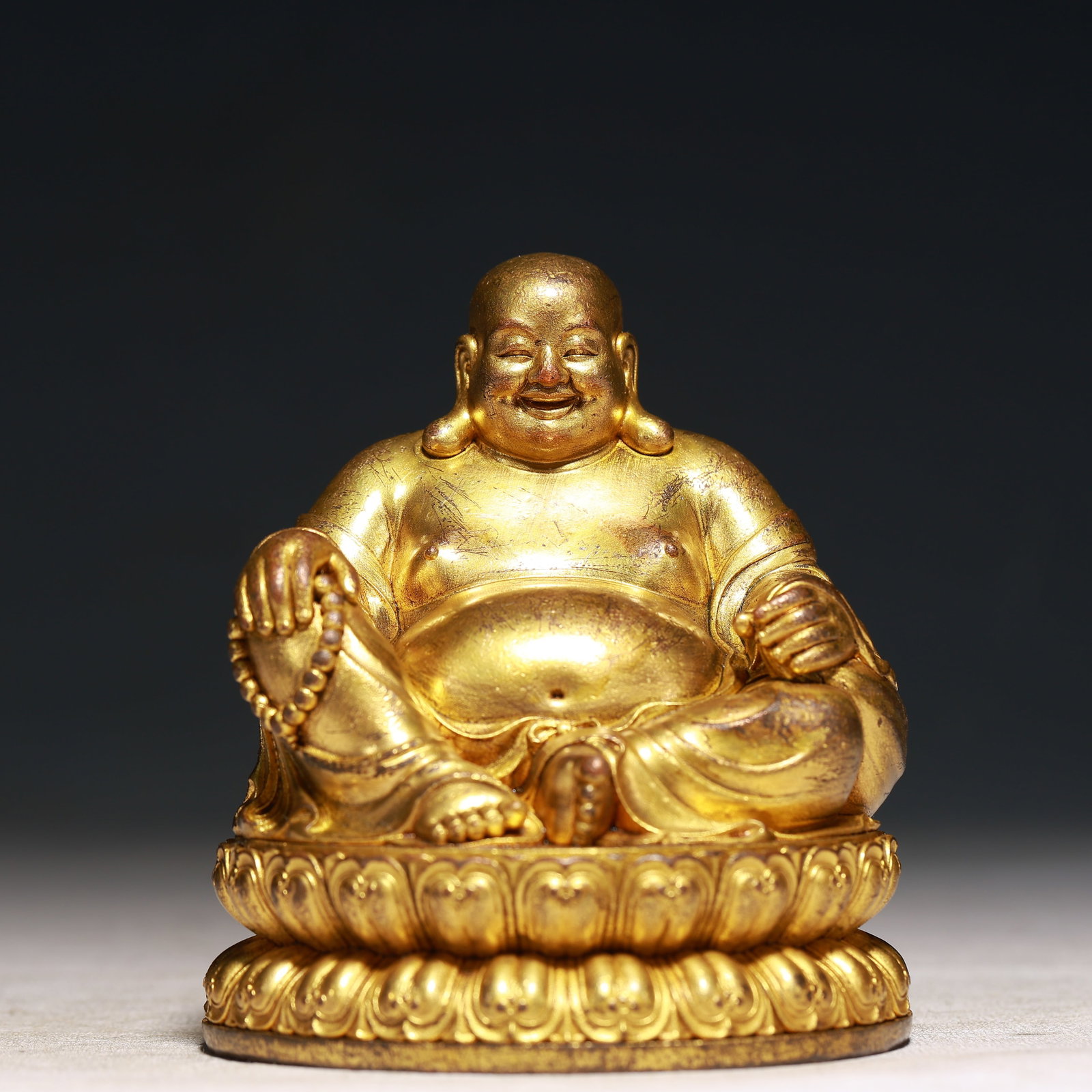 A Solemn Gilt Bronze Statue of Maitreya Buddha: A Solemn Gilt Bronze Statue of Maitreya Buddha,Qing Dynasty,China,Size:3.5inx3.9in,Weight:650g 铜鎏金弥勒佛像,中国清代