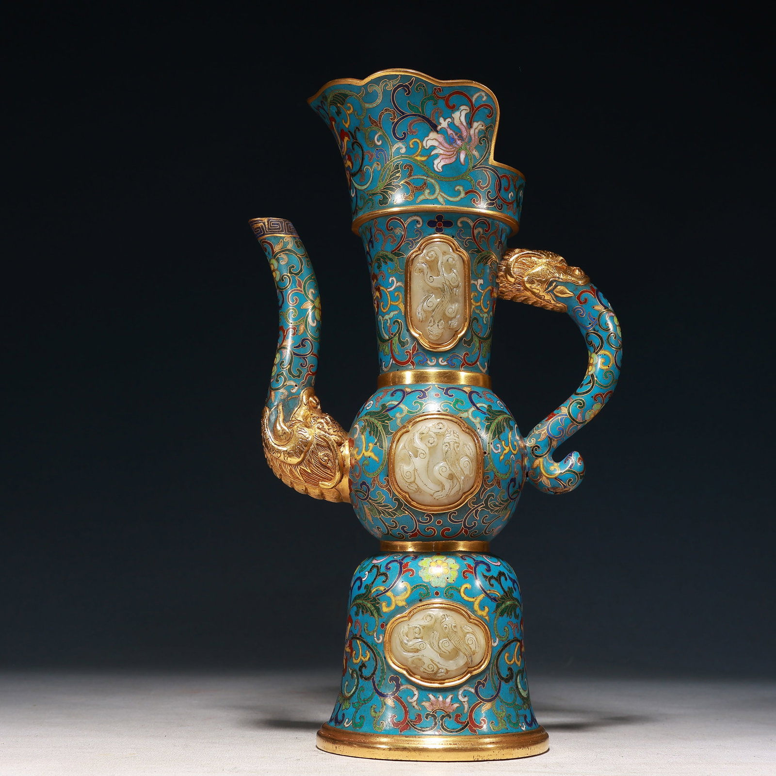 A Rare Cloisonne Inlaid White Jade Lotus and Chi-Dragon Pattern Ewer: A Rare Cloisonne Inlaid White Jade Lotus and Chi-Dragon Pattern Ewer,Qing Dynasty,China,Qianlong Four-character Mark,Size:6.7inx4.3inx11.8in,Weight:1650g