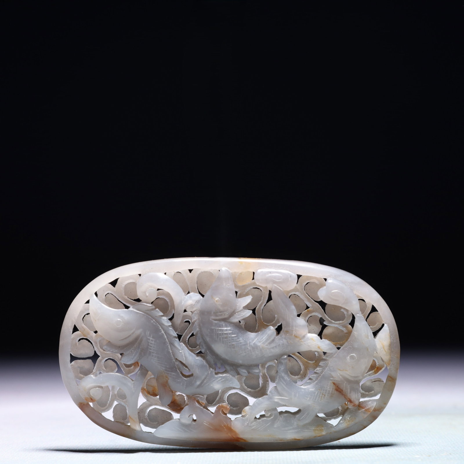 An Exquisite White Jade Fish Pattern Pendant: An Exquisite White Jade Fish Pattern Pendant,Qing Dynasty,China,Size:4.3inx2.4in,Weight:124.7g 白玉鱼纹佩,中国清代