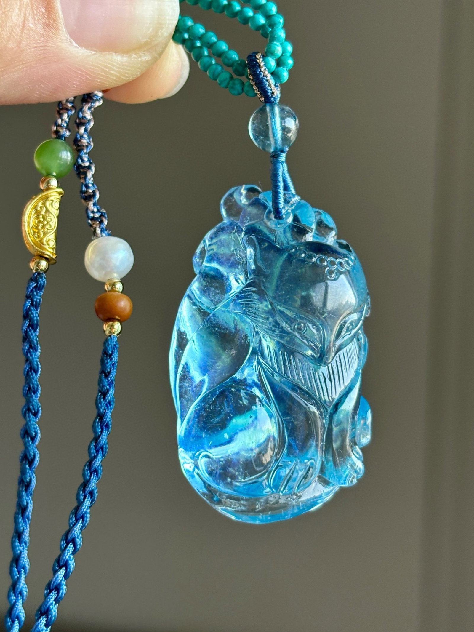 An Exquisite Aquamarine Nine-Tailed Fox Pendant: An Exquisite Aquamarine Nine-Tailed Fox Pendant,Size:42mmx25mmx17mm,Total Weight:22.7g 海蓝宝九尾狐吊坠