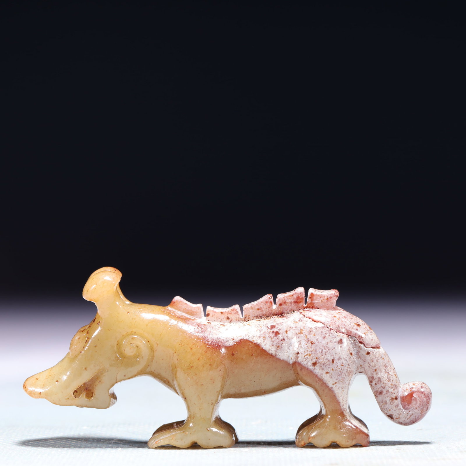 An Exquisite White Jade Beast Ornament: An Exquisite White Jade Beast Ornament,Qing Dynasty,China,Size:3.3inx0.8inx1.2in,Weight:53.7g 白玉兽摆件,中国清代