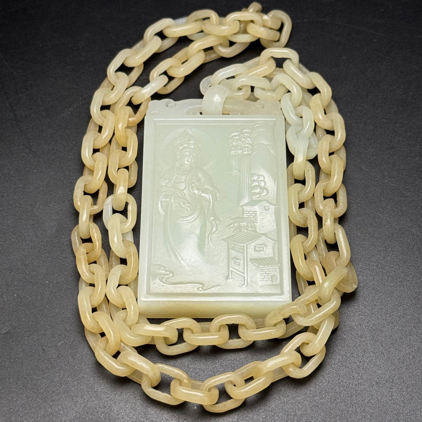 An Exquisite White Jade Landscape and Statue of Avalokitesvara Pattern Pendant (1 of 7)