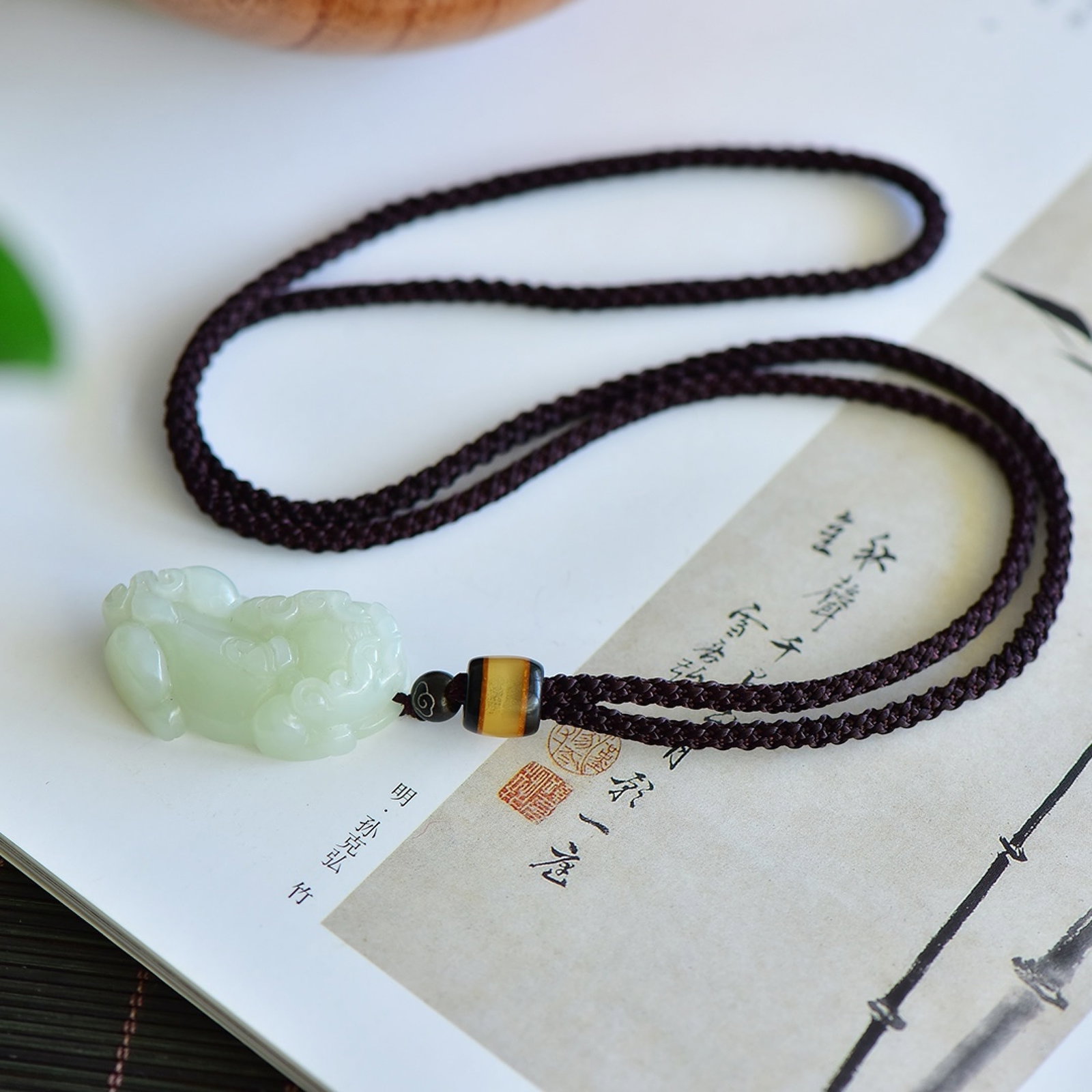 An Exquisite Greenish Jade Auspicious Beast Pendant: An Exquisite Greenish Jade Auspicious Beast Pendant,Size:37mm-22mm,39mm-21mm 青白玉瑞兽吊坠