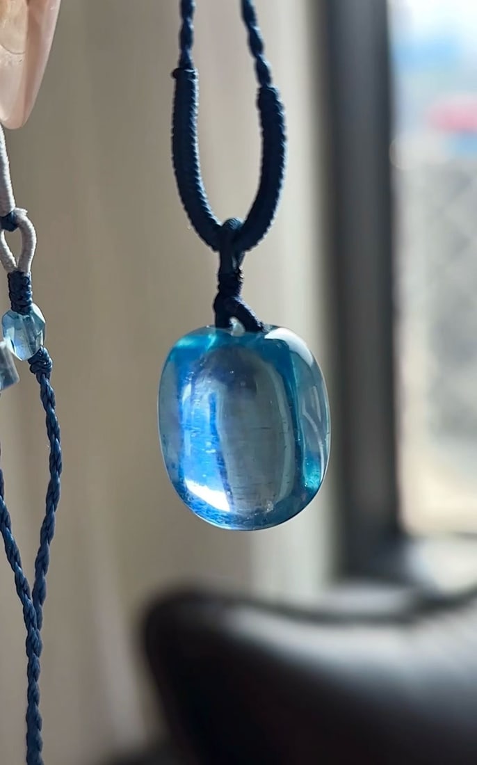 An Exquisite Aquamarine Pendant: An Exquisite Aquamarine Pendant,Size:15mmx12mm,Weight:9.8g 海蓝宝吊坠