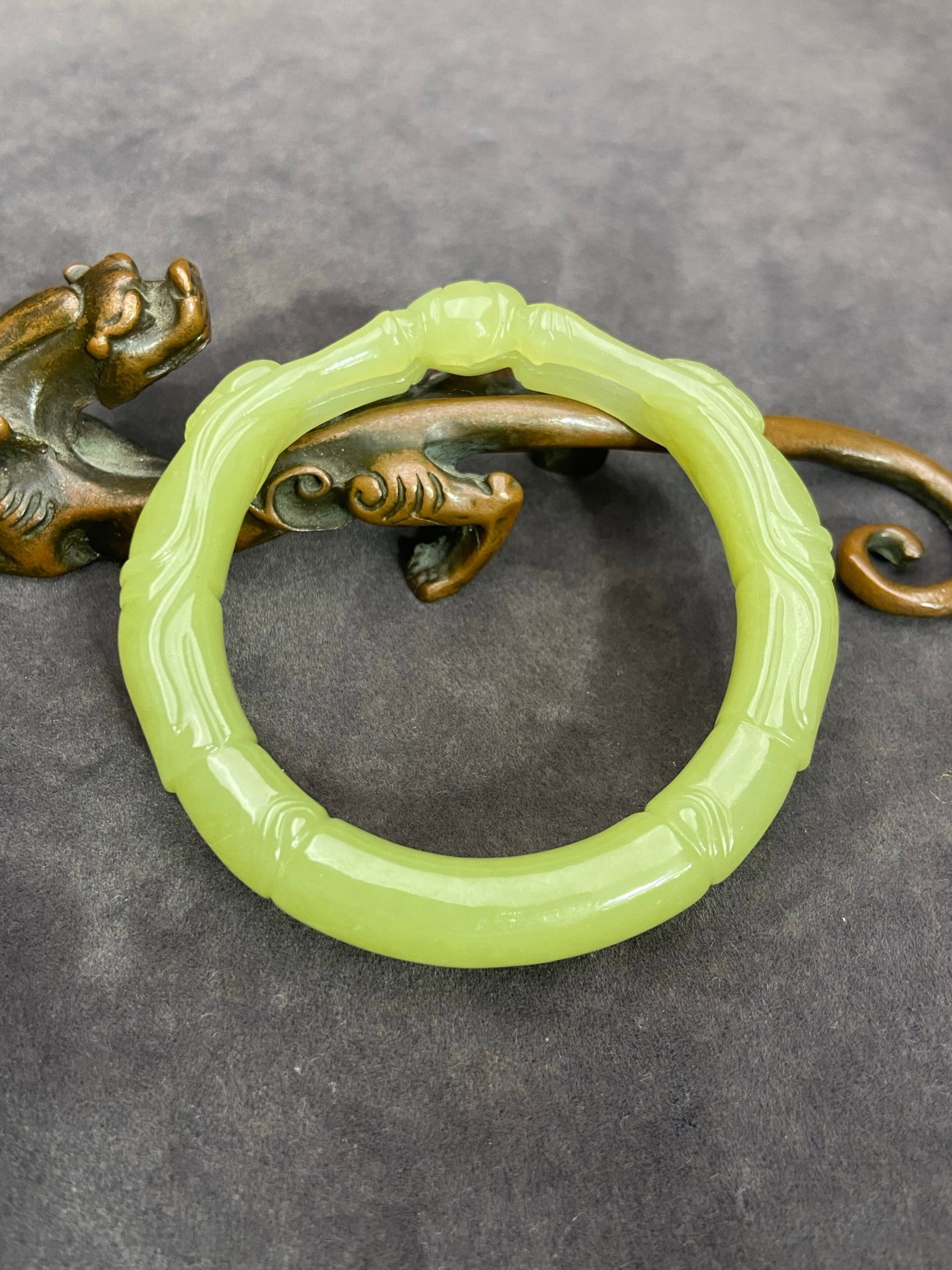 An Exquisite Yellow Jade Figure Pattern Bracelets: An Exquisite Yellow Jade Figure Pattern Bracelets,Qing Dynasty,China,Size:12.3mmx52.7mm,Weight:44g 黄玉人物纹手镯,中国清代