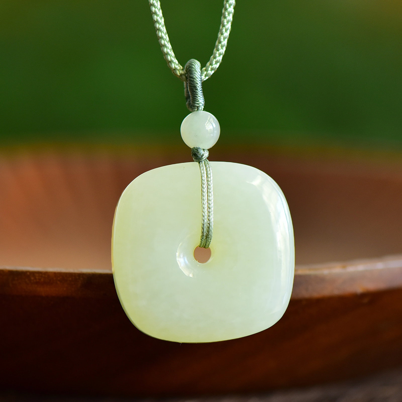 An Exquisite White Jade Pendant: An Exquisite White Jade Pendant,Size:30mmx30mmx10mm 寓意: 四方平安如意 白玉吊坠