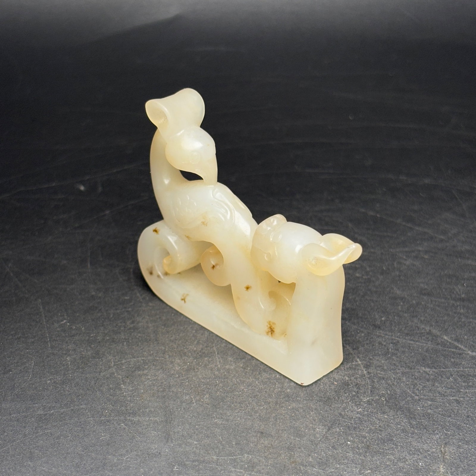 An Exquisite White Jade Dragon and Phoenix Pattern Ornament: An Exquisite White Jade Dragon and Phoenix Pattern Ornament,Qing Dynasty,China,Size:55mmx46mmx12mm,Weight:37g 白玉龙凤纹摆件,中国清代