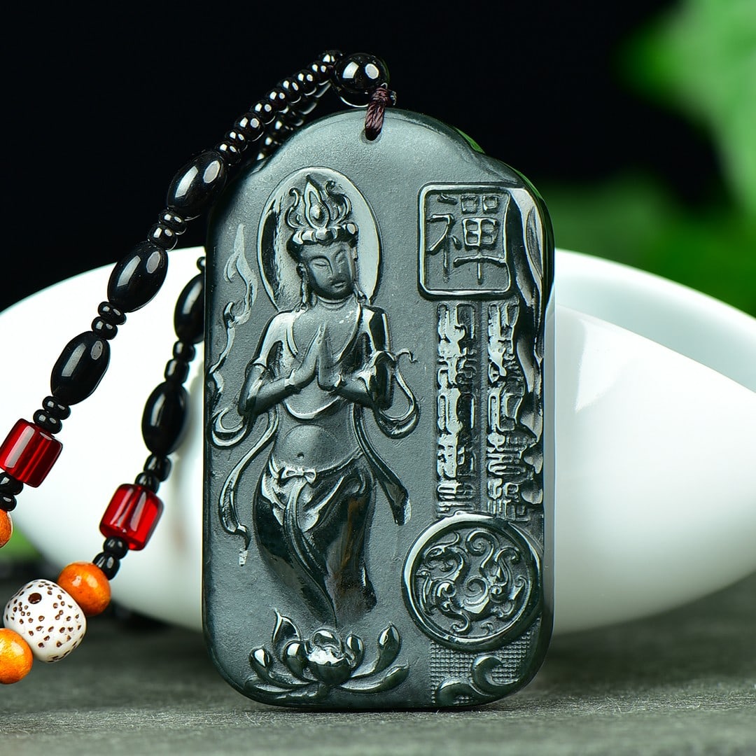 An Exquisite Sapphire Auspicious Cloud and Avalokitesvara Pattern Pendant: An Exquisite Sapphire Auspicious Cloud and Avalokitesvara Pattern Pendant,Size:39mmx65mm 寓意:吉祥 普度众生 保平安 青玉