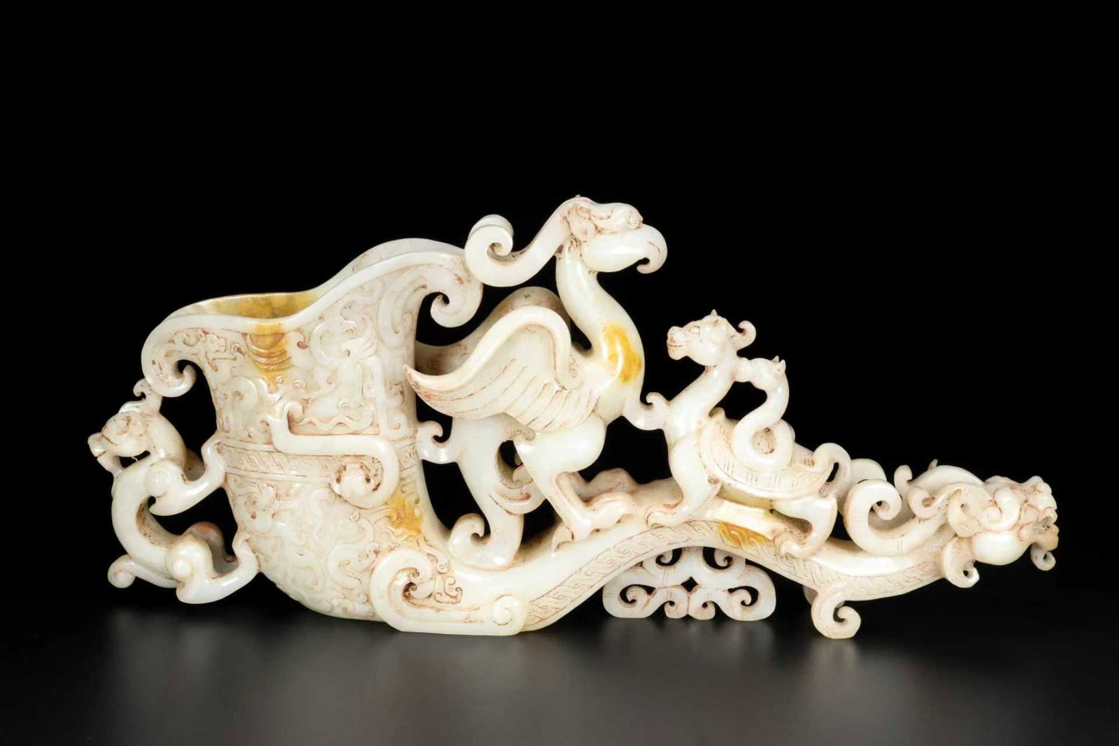 An Exquisite White Jade Dragon and Phoenix Pattern Cup: An Exquisite White Jade Dragon and Phoenix Pattern Cup,Qing Dynasty,China,Size:14.2inx2.4inx6.7in,Weight:2205g 白玉龙凤纹杯,中国清代