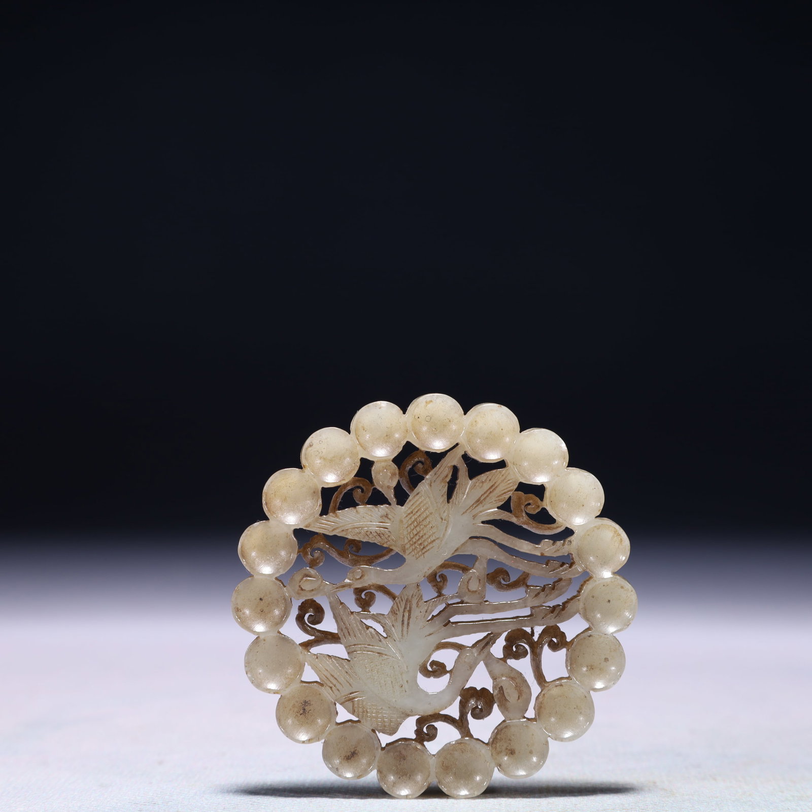 An Exquisite White Jade Flower and Crane Pattern Pendant: An Exquisite White Jade Flower and Crane Pattern Pendant,Qing Dynasty,China,Size:2.2inx2.2in,Weight:28.3g 白玉花卉鹤纹佩,中国清代