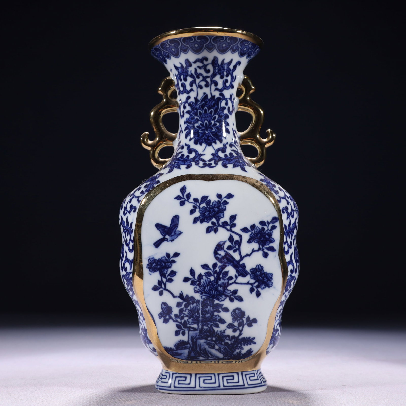 An Exquisite Blue and White Flower and Bird Pattern Double-Ears Vase: An Exquisite Blue and White Flower and Bird Pattern Double-Ears Vase,Qing Dynasty,China,Qianlong Six-character Mark,Size:4.3inx2.8inx8.5in,Weight:500g