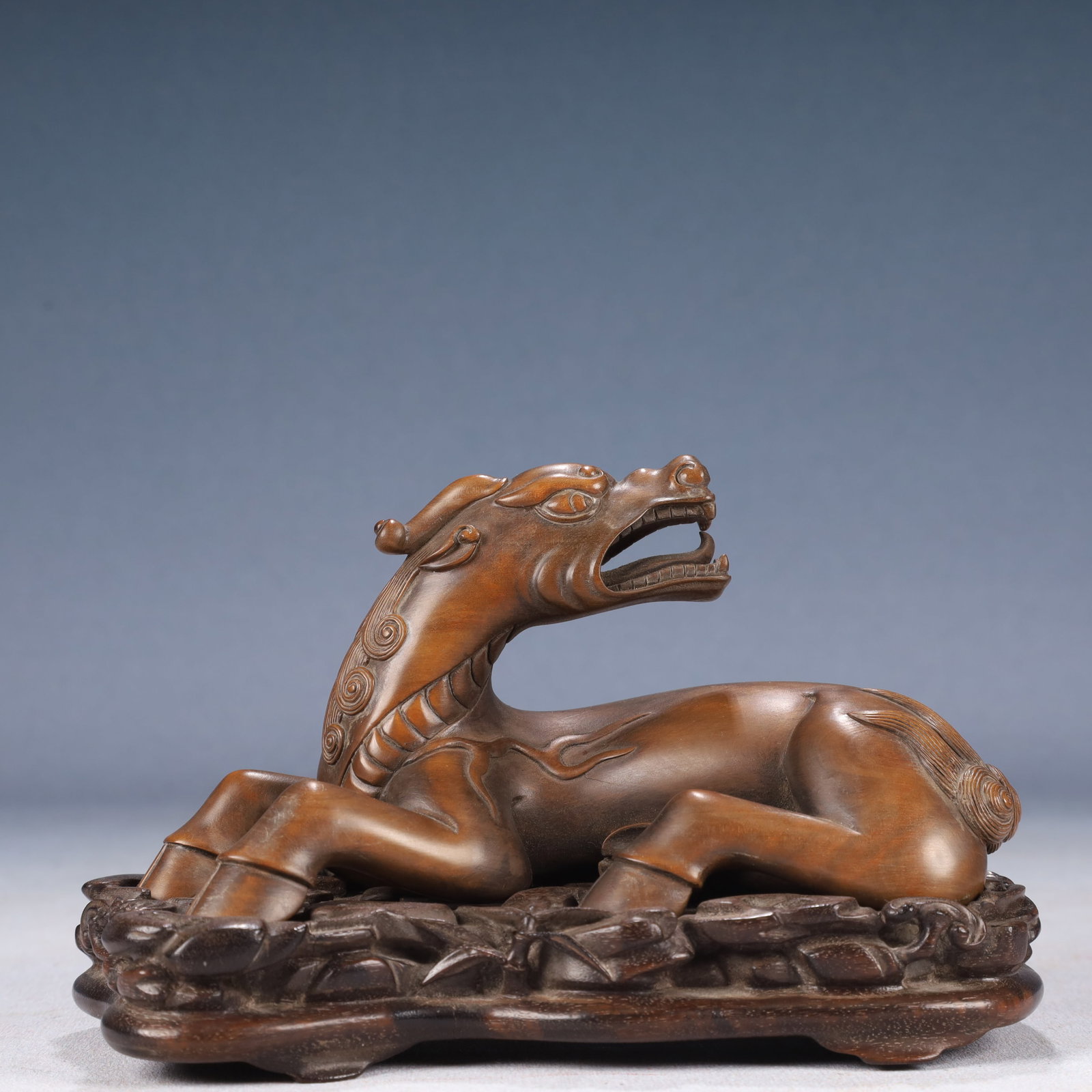 An Exquisite Boxwood Auspicious Beast Ornament,With Base: An Exquisite Boxwood Auspicious Beast Ornament,With Base,Qing Dynasty, China,Size:6.3inx3.1inx4.3in,Weight:450g 黄杨木瑞兽摆件,带底座,ߑ