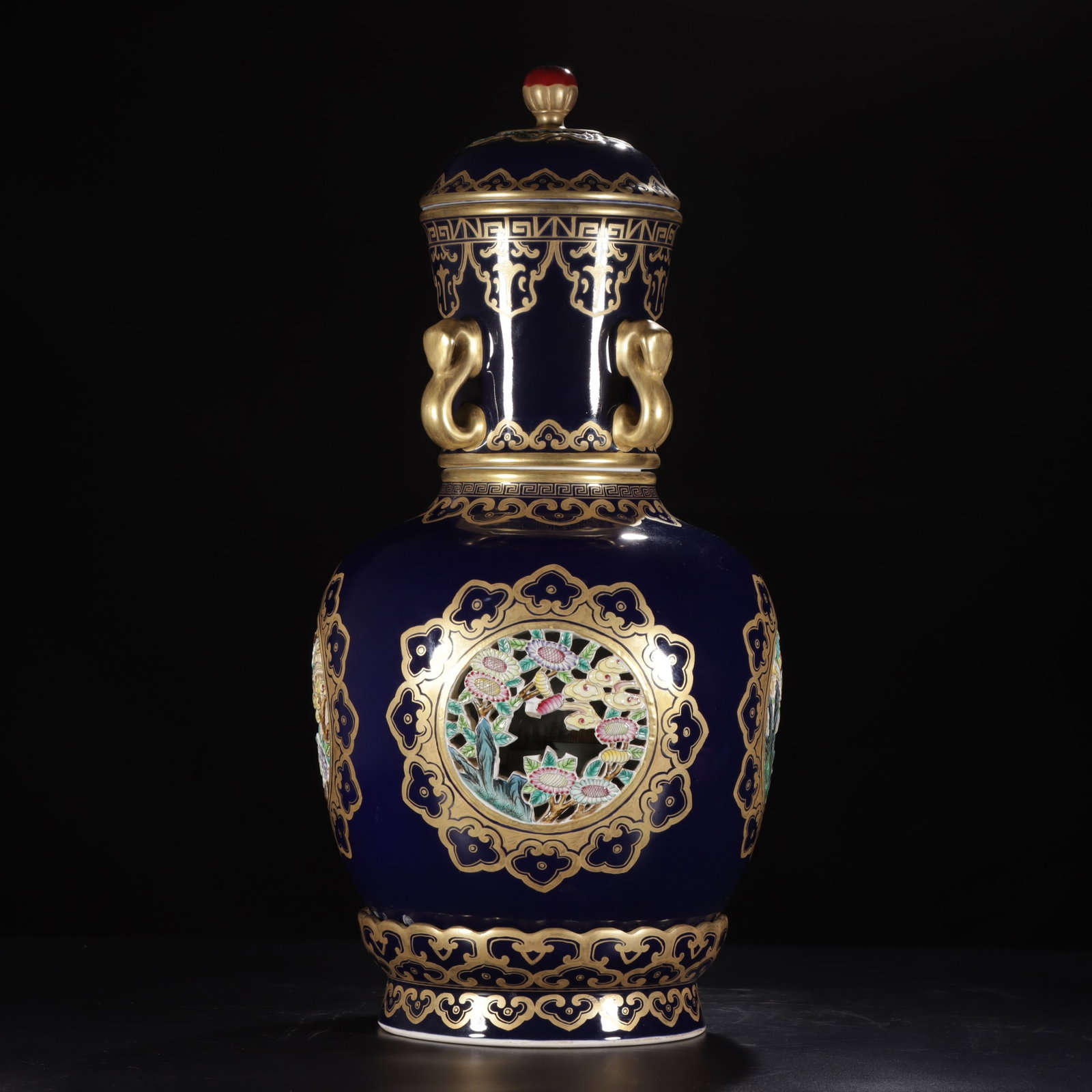 A Huge Ji Blue Glazed Painted Gold Flower Pattern Bottle: A Huge Ji Blue Glazed Painted Gold Flower Pattern Bottle,Qing Dynasty,China,Qianlong Four-character Mark,Size:22.2inx7.6in 霁蓝釉描金花卉纹盖ī