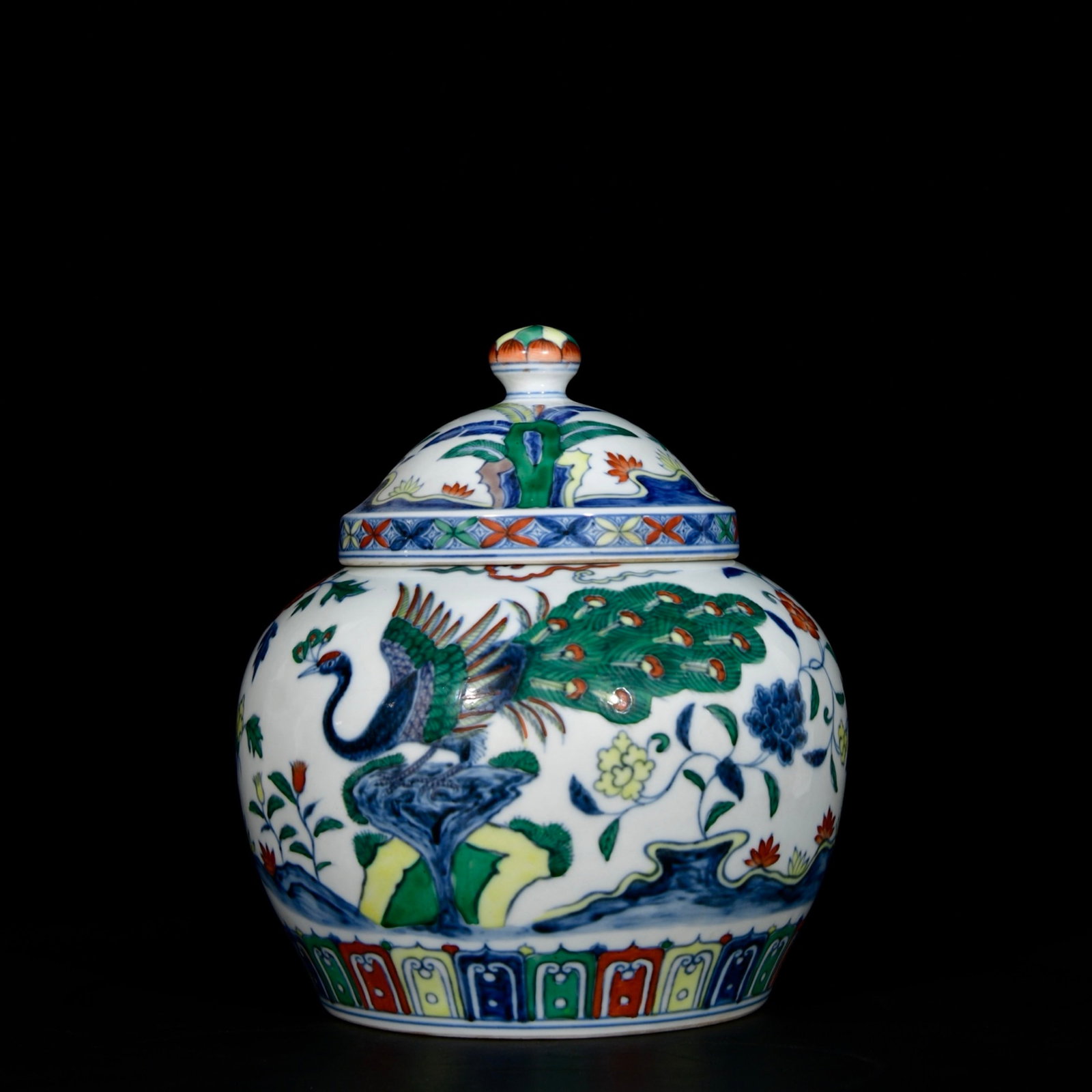 An Exquisite Doucai Peony and Peacock PatternCover Jar