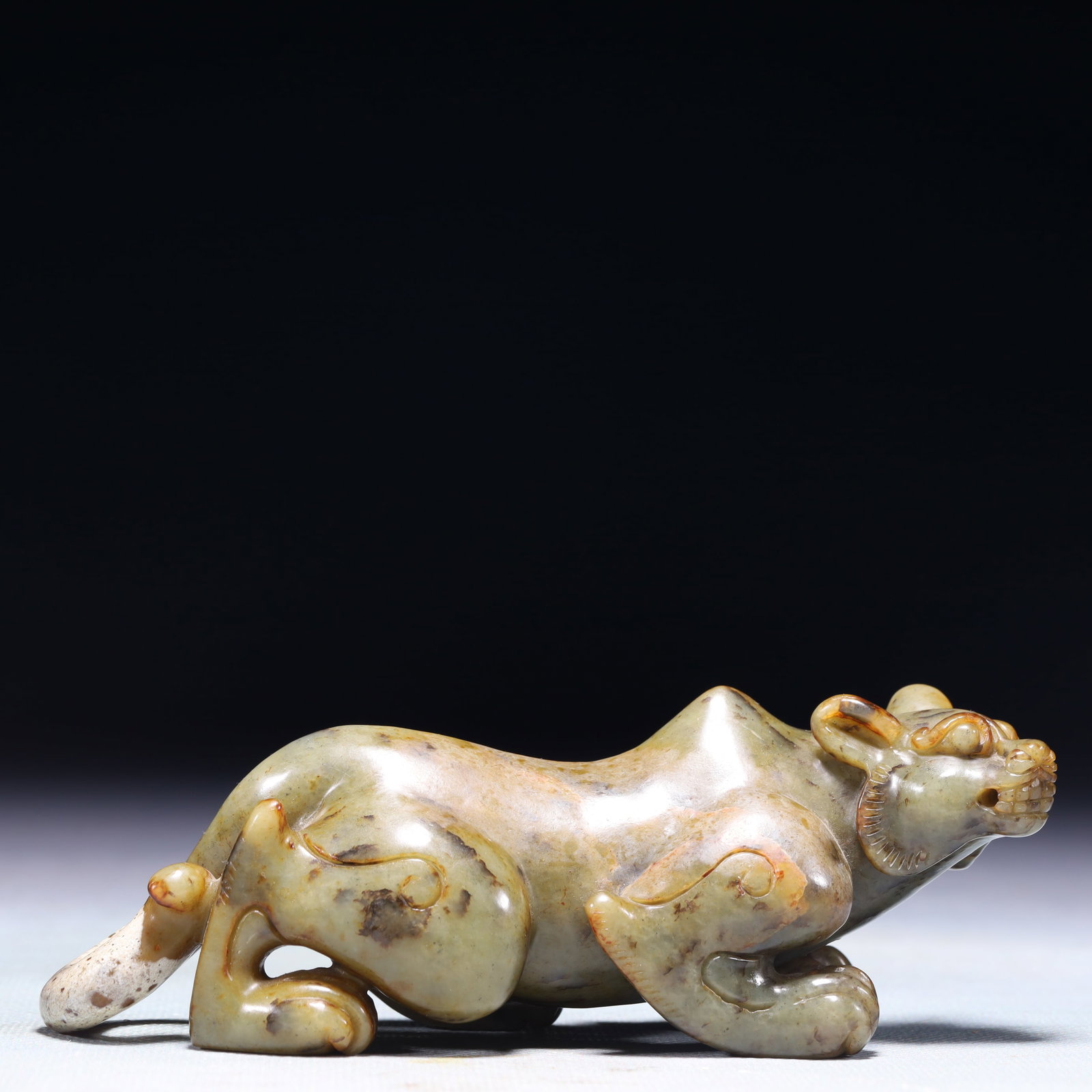 An Exquisite White Jade Auspicious Beast Ornament (1 of 10)