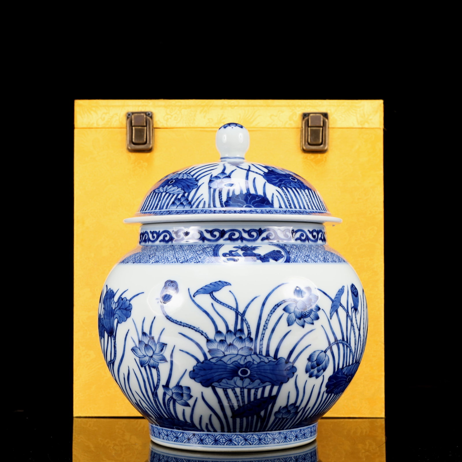 An Exquisite Blue and White Lotus Pattern Cover Jar: An Exquisite Blue and White Lotus Pattern Cover Jar,Qing Dynasty, China,Qianlong Six-character Mark,Size:7.9inx7.9inx10.6in 青花莲花纹盖罐,中国