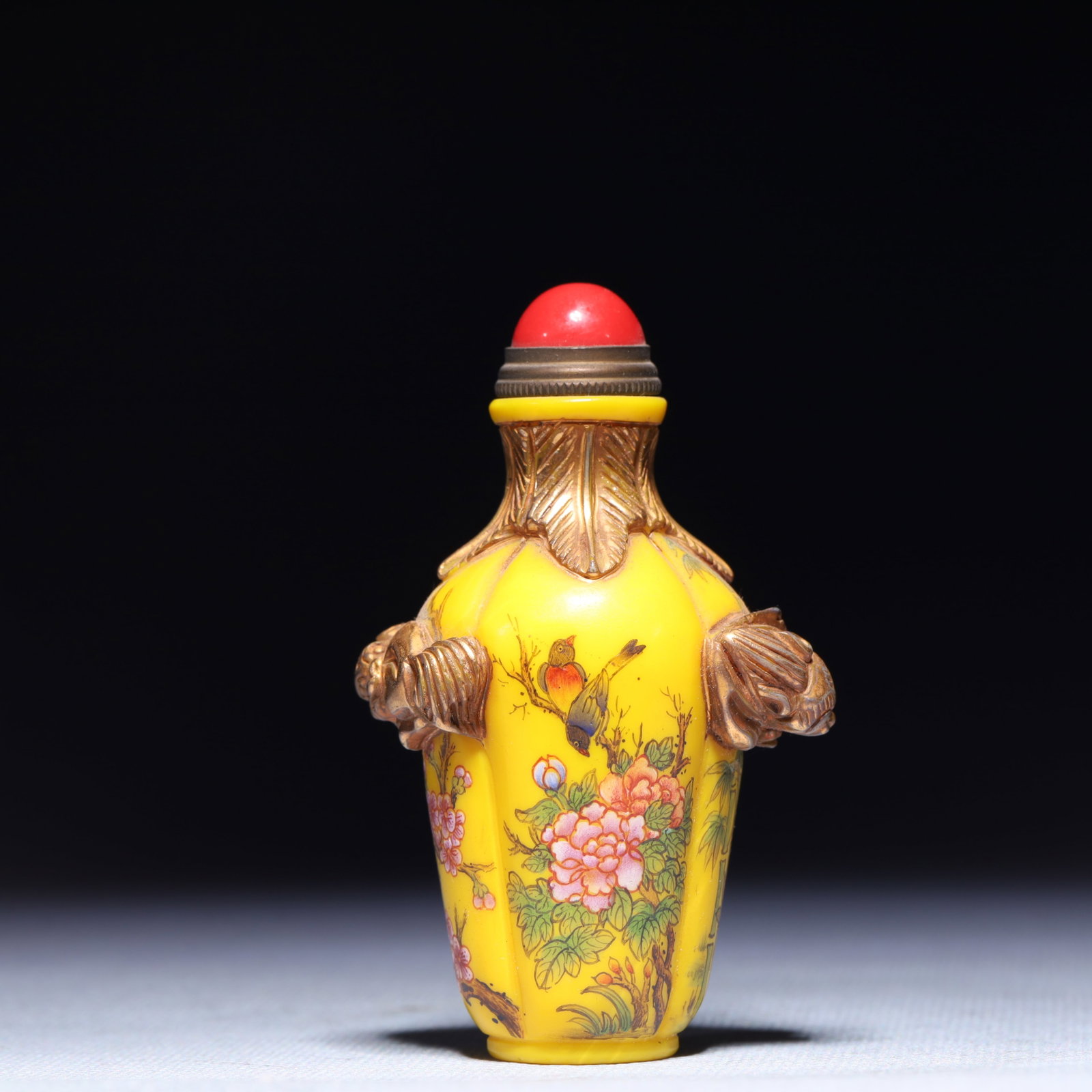 An Exquisite Glass Flower and Bird Pattern Snuff Bottle: An Exquisite Glass Flower and Bird Pattern Snuff Bottle,Qing Dynasty,China,Qianlong Four-character Mark,Size:2inx3.1in,Weight:95.4g