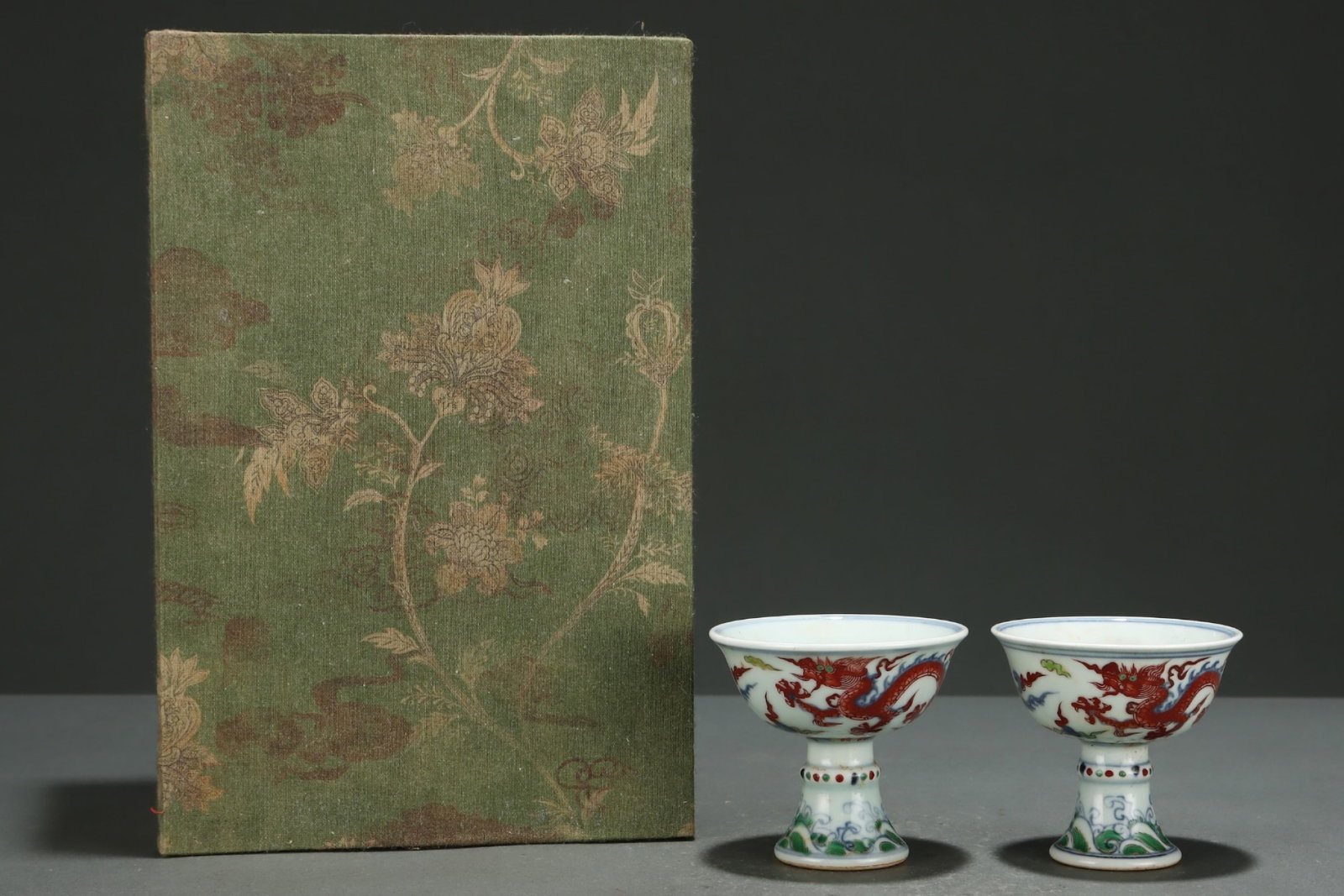 A Pair of Exquisite Wucai Dragon and Phoenix Pattern Stem Cups (1 of 8)