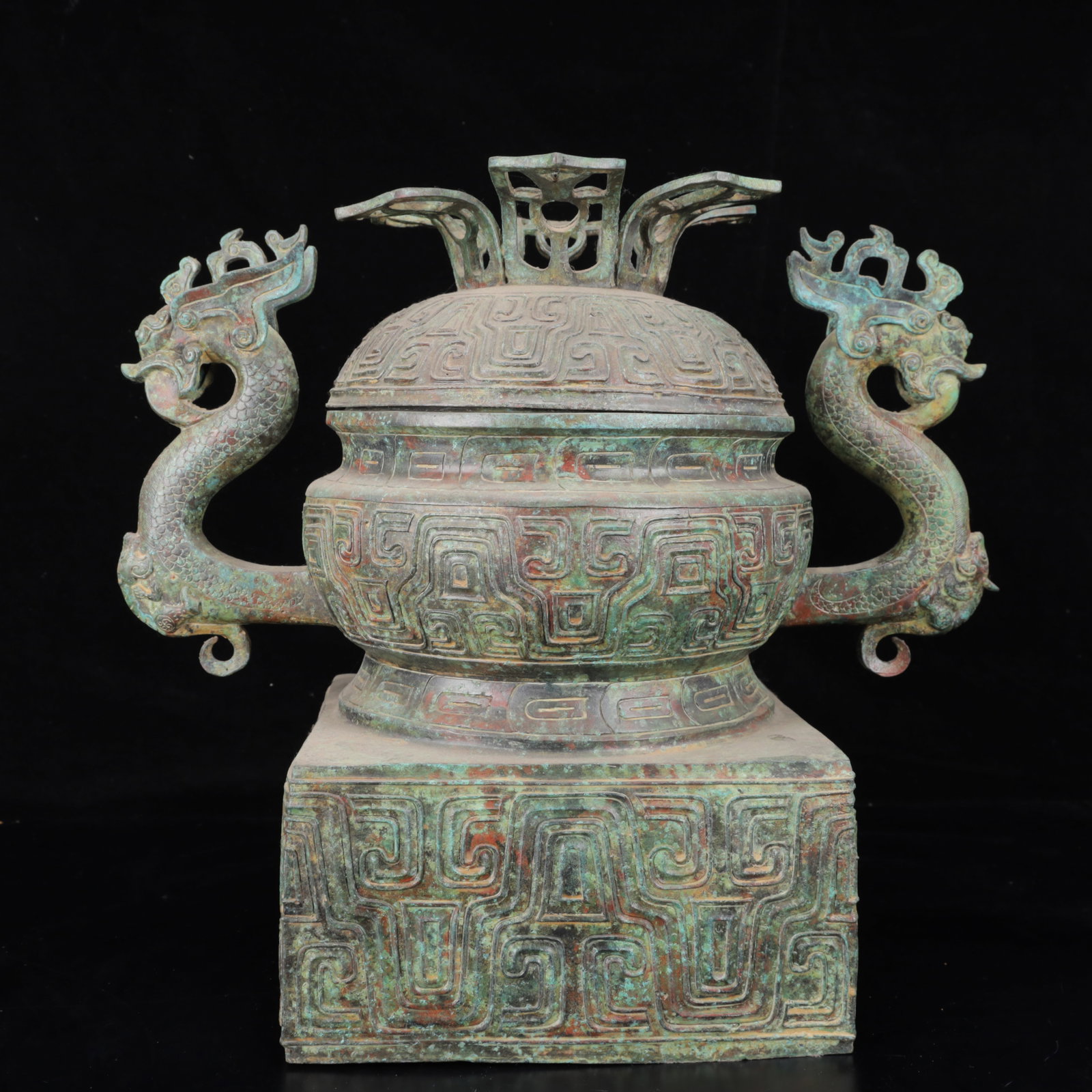 An Archaic Bronze Dragon Pattern Double-Ears Censer: An Archaic Bronze Dragon Pattern Double-Ears Censer,The Warring States period in China,Size:16.9inx9.8inx15.4in,Weight:9550g 青铜龙纹双耳香炉,中&#