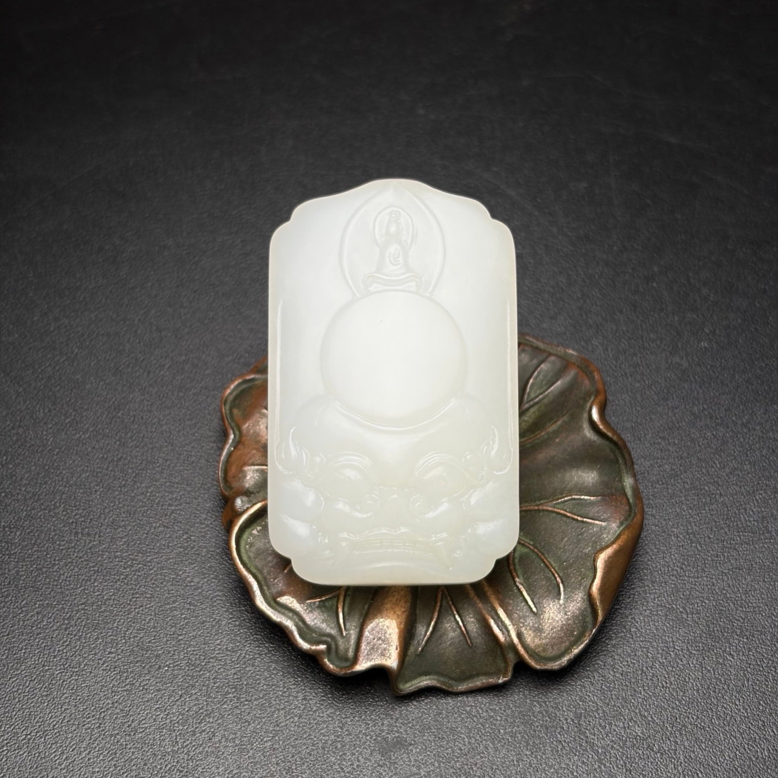 An Exquisite White Jade Beast-Face Pattern Pendant: An Exquisite White Jade Beast-Face Pattern Pendant,Qing Dynasty,China,Size:1.8inx1.1inx0.4in,Weight:26g 白玉兽面纹挂件,中国清代