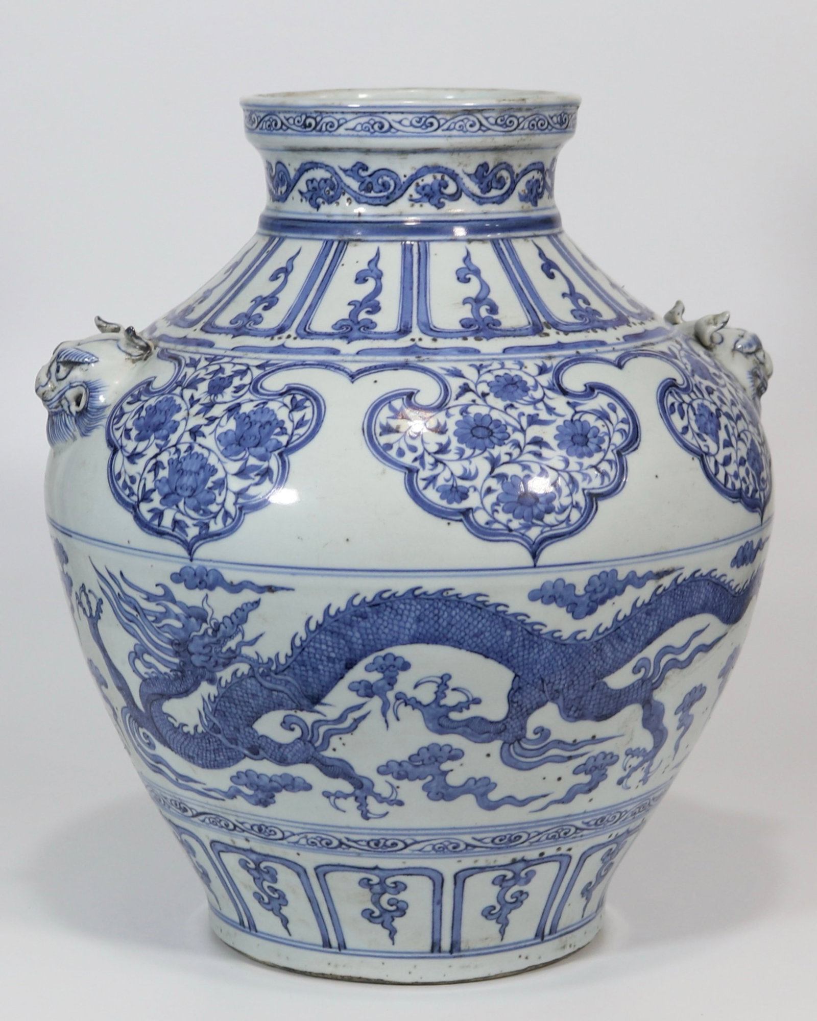 A Rare Blue and White Auspicious Cloud and Dragon Pattern Beast-Ears Jar: A Rare Blue and White Auspicious Cloud and Dragon Pattern Beast-Ears Jar,Yuan Dynasty,China,Size:15.4inx6in 青花祥云龙纹兽耳罐,中国
