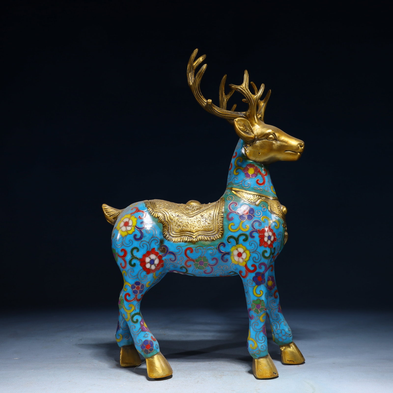 An Exquisite Cloisonne Lotus Pattern Deer Ornament: An Exquisite Cloisonne Lotus Pattern Deer Ornament,Qing Dynasty,China,Size:8.3inx4.7inx14.2in,Weight:2550g 景泰蓝缠枝莲纹鹿摆件,中