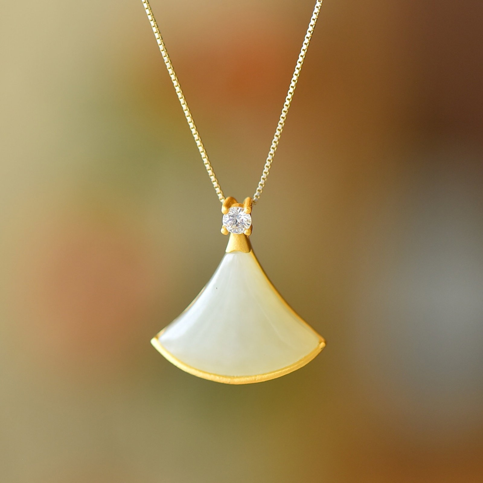 A Set of Fine Sterling Silver-Gold Plated Inlaid White Jade Jewelrys: A Set of Fine Sterling Silver-Gold Plated Inlaid White Jade Jewelrys,Size:(Pendant)0.6inx0.8in,(Ring)0.5inx0.6in,(Earrings)0.5inx0.6in,(Bracelet)0.5inx0.6in