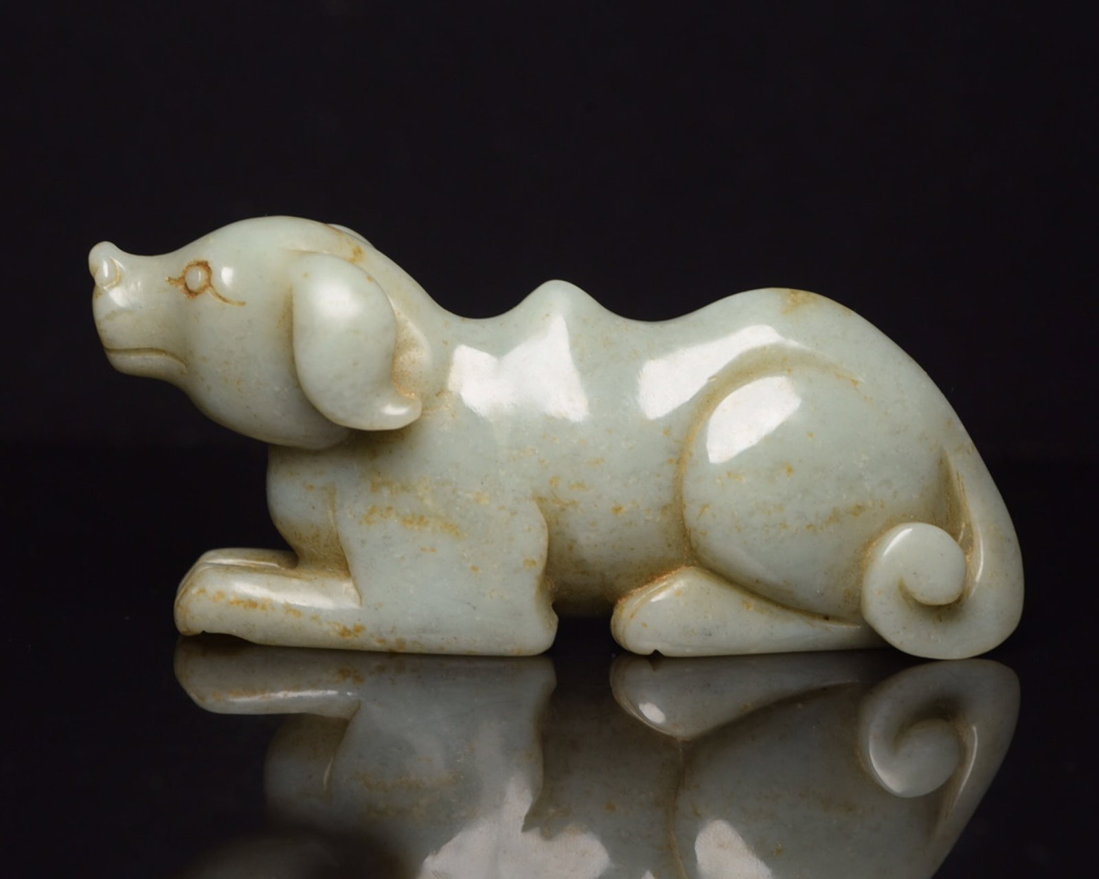 An Exquisite White Jade Dog Ornament: An Exquisite White Jade Dog Ornament,Qing Dynasty,China,Size:4.7inx2.1inx1.2in,Weight:241g 白玉犬摆件,中国清代