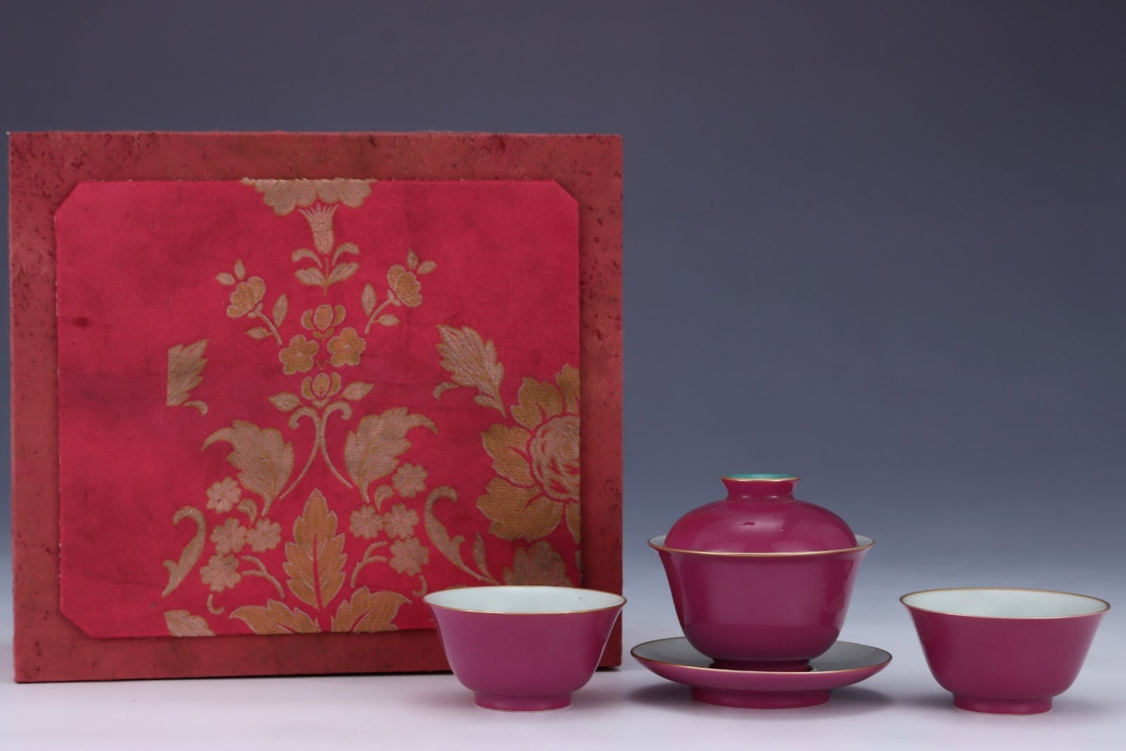 A Set of Fine Ruby Red-Glazed Painted Gold Bowls with Cover: A Set of Fine Ruby Red-Glazed Painted Gold Bowls with Cover,Qing Dynasty,China,Yongzheng Four-character Mark,Size:(Bowl with Cover)3.8inx4.4in,(Cup)1.8inx3.4in