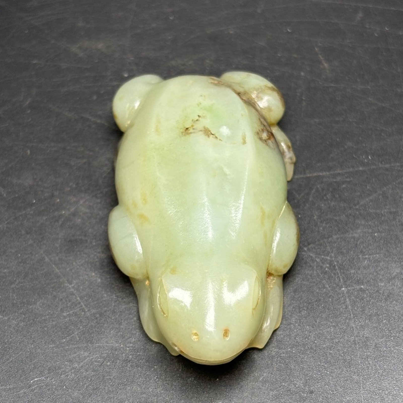 An Exquisite White Jade Frog Hand Piece: An Exquisite White Jade Frog Hand Piece,Qing Dynasty, China,Size:2.9inx1.4inx0.7in,Weight:81g 白玉青蛙手把件,中国清代