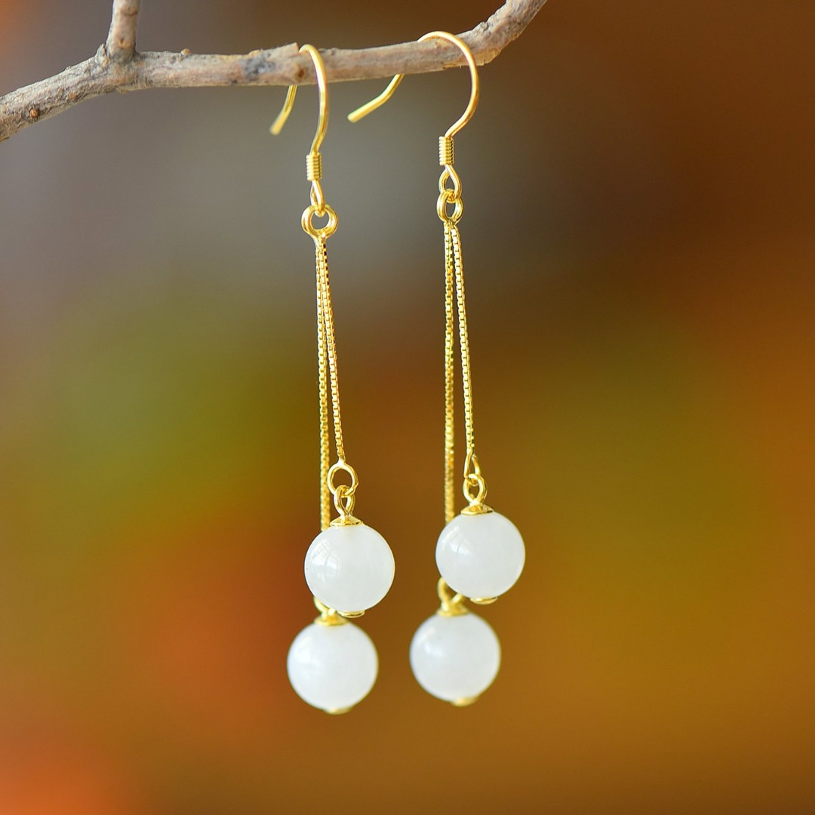 A Pair of Exquisite Sterling Silver-Gold Plated Inlaid White Jade Earrings: A Pair of Exquisite Sterling Silver-Gold Plated Inlaid White Jade Earrings,Size:0.3in 一对纯银镀金镶白玉耳环