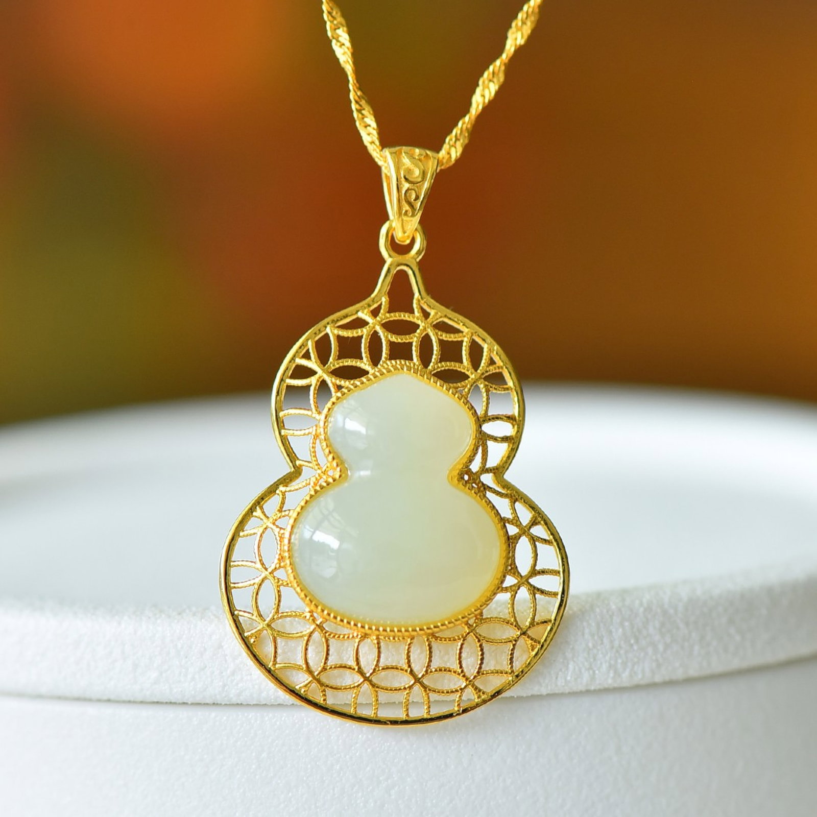 An Exquisite Sterling Silver-Gold Plated Inlaid White Jade Pendant: An Exquisite Sterling Silver-Gold Plated Inlaid White Jade Pendant 纯银镀金镶白玉吊坠
