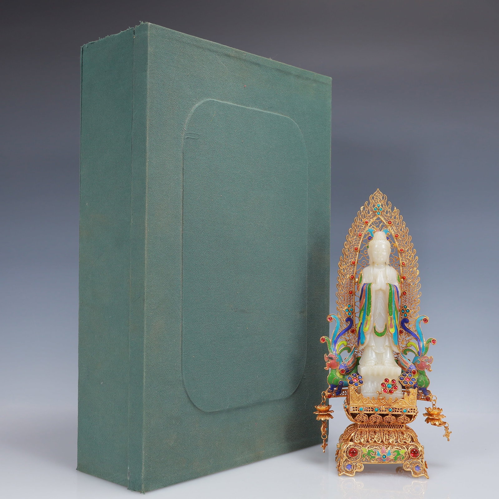 An Exquisite Filigree and Gilding Inlaid White Jade Buddha Statue,Inlaid Gems: An Exquisite Filigree and Gilding Inlaid White Jade Buddha Statue,Inlaid Gems,Qing Dynasty, China,Qianlong Four-Character Mark,Size:5.1inx2.8inx10.6in,(Box)16.5inx10.6inx3.9in,Weight:700g